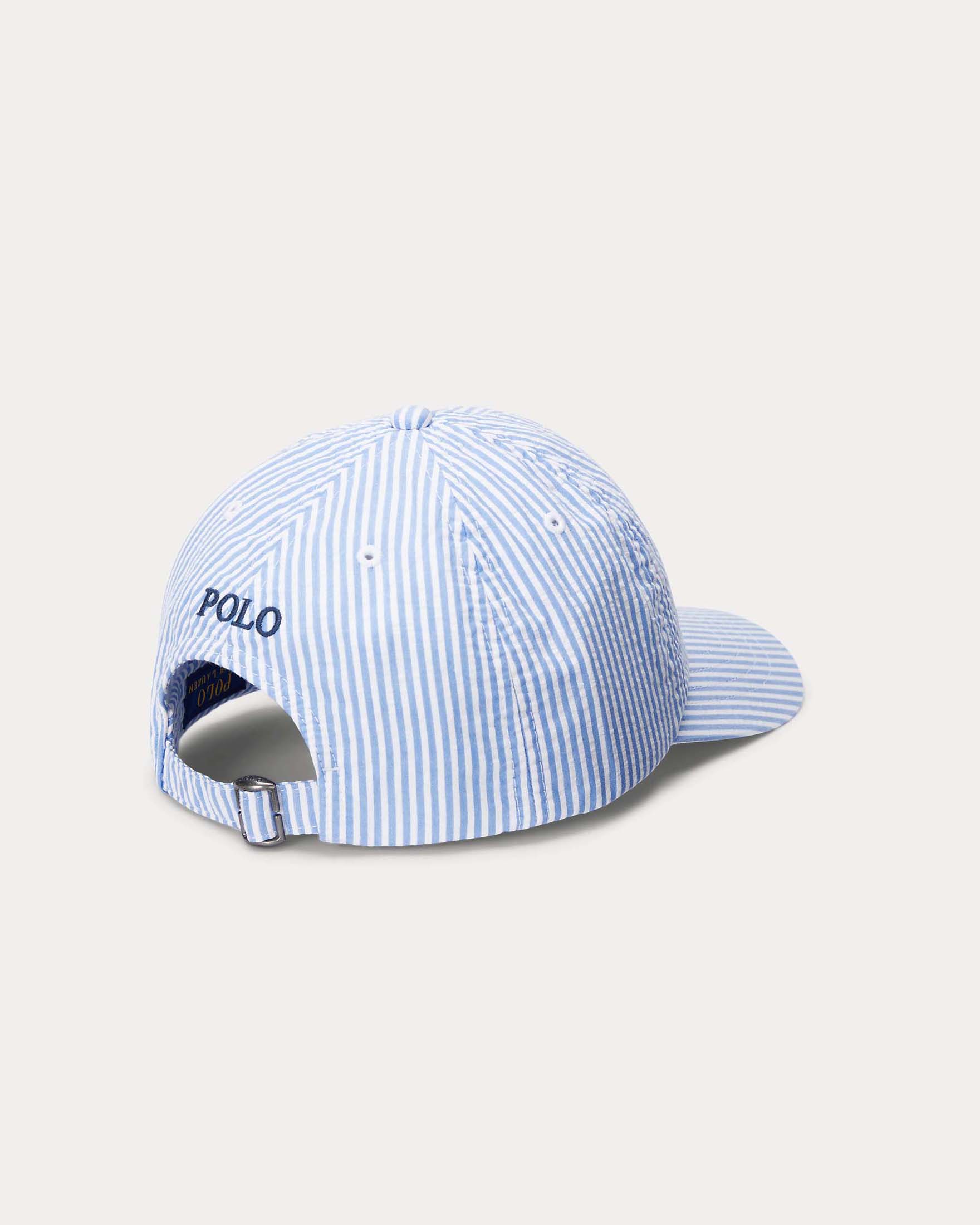 Berretto Ralph Lauren a righe azzurro e bianco in cotone con frontino e logo icon blu image