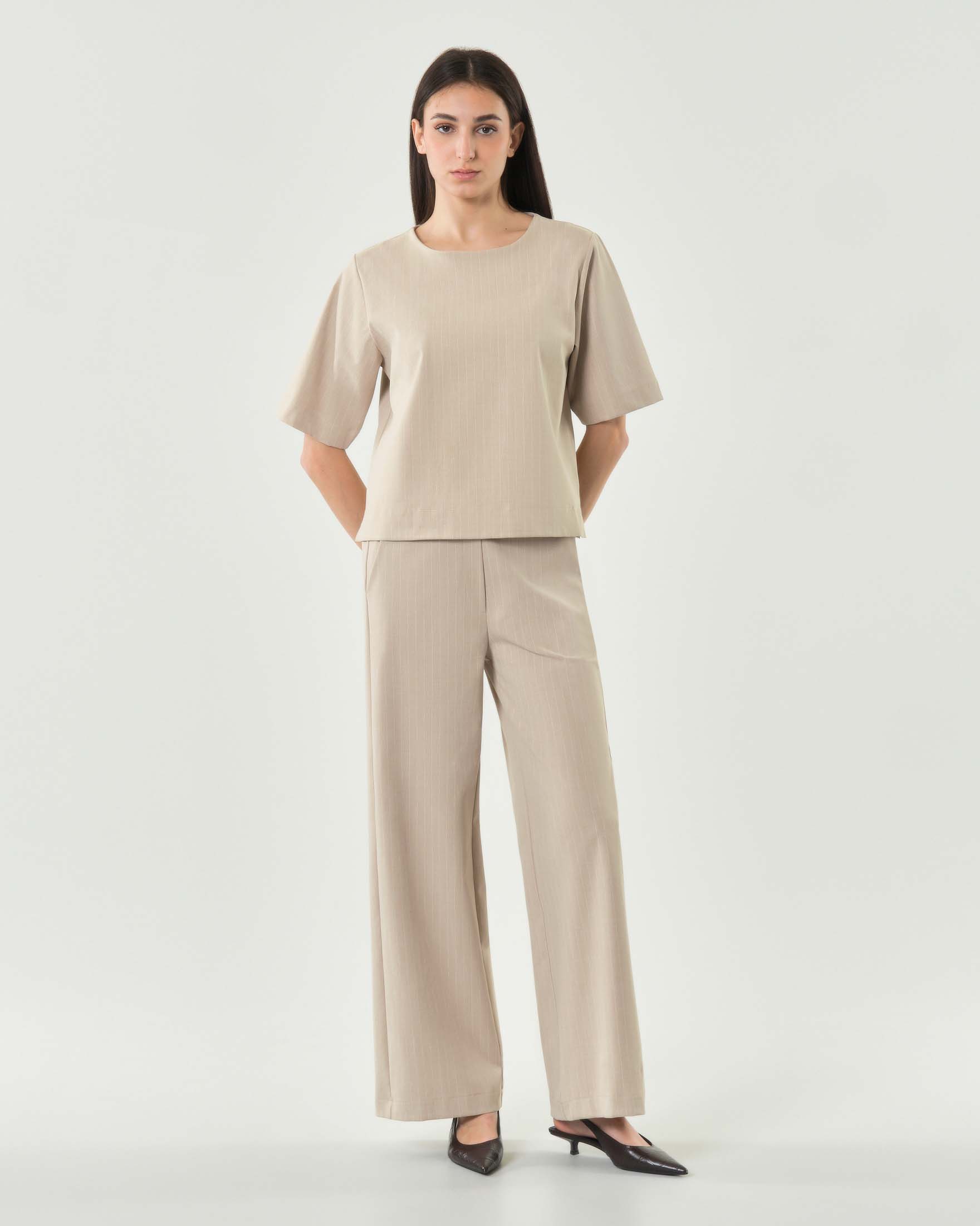 Pantaloni palazzo beige gessato in misto cotone con tasche alla francese ed elastico in vita