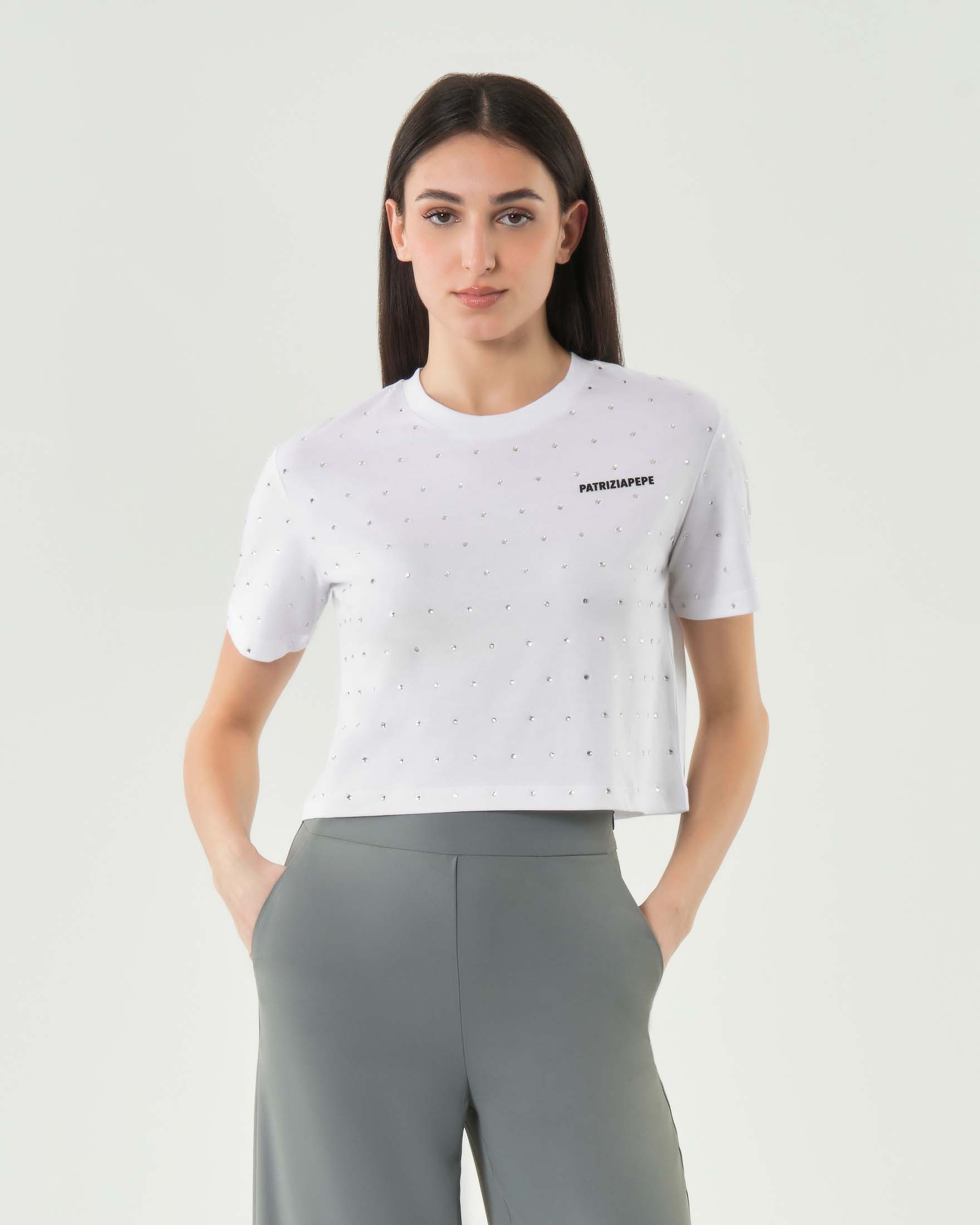 T-shirt bianca cropped a maniche corte in cotone con scollo a giro e strass sul davanti