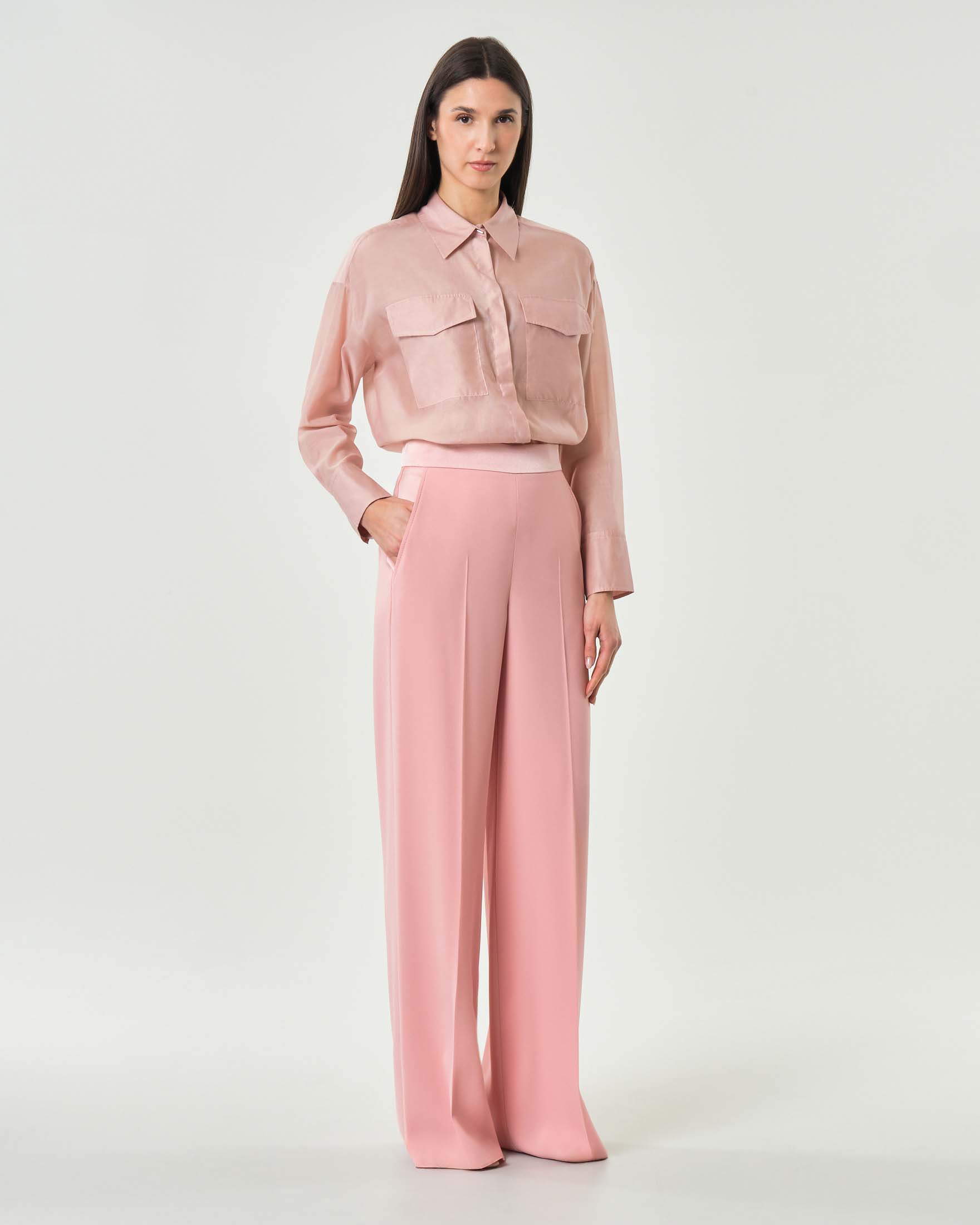 Pantaloni a palazzo rosa in crepe con piega fronte e retro e chiusura a zip