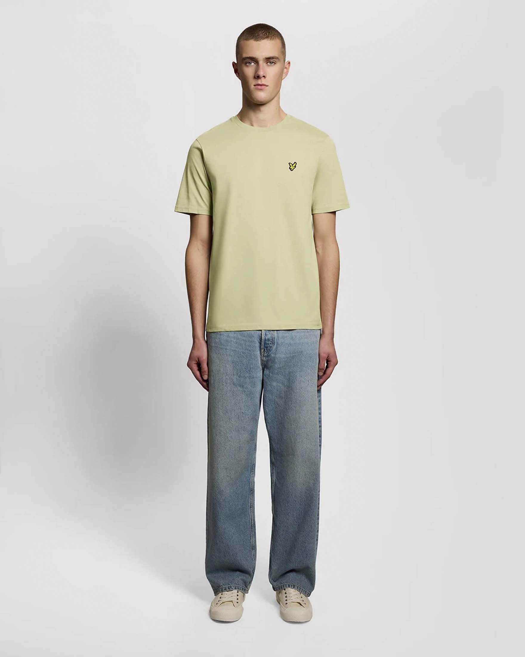 T-shirt mezza manica verde pistacchio in cotone con logo aquila gialla ricamata sul petto