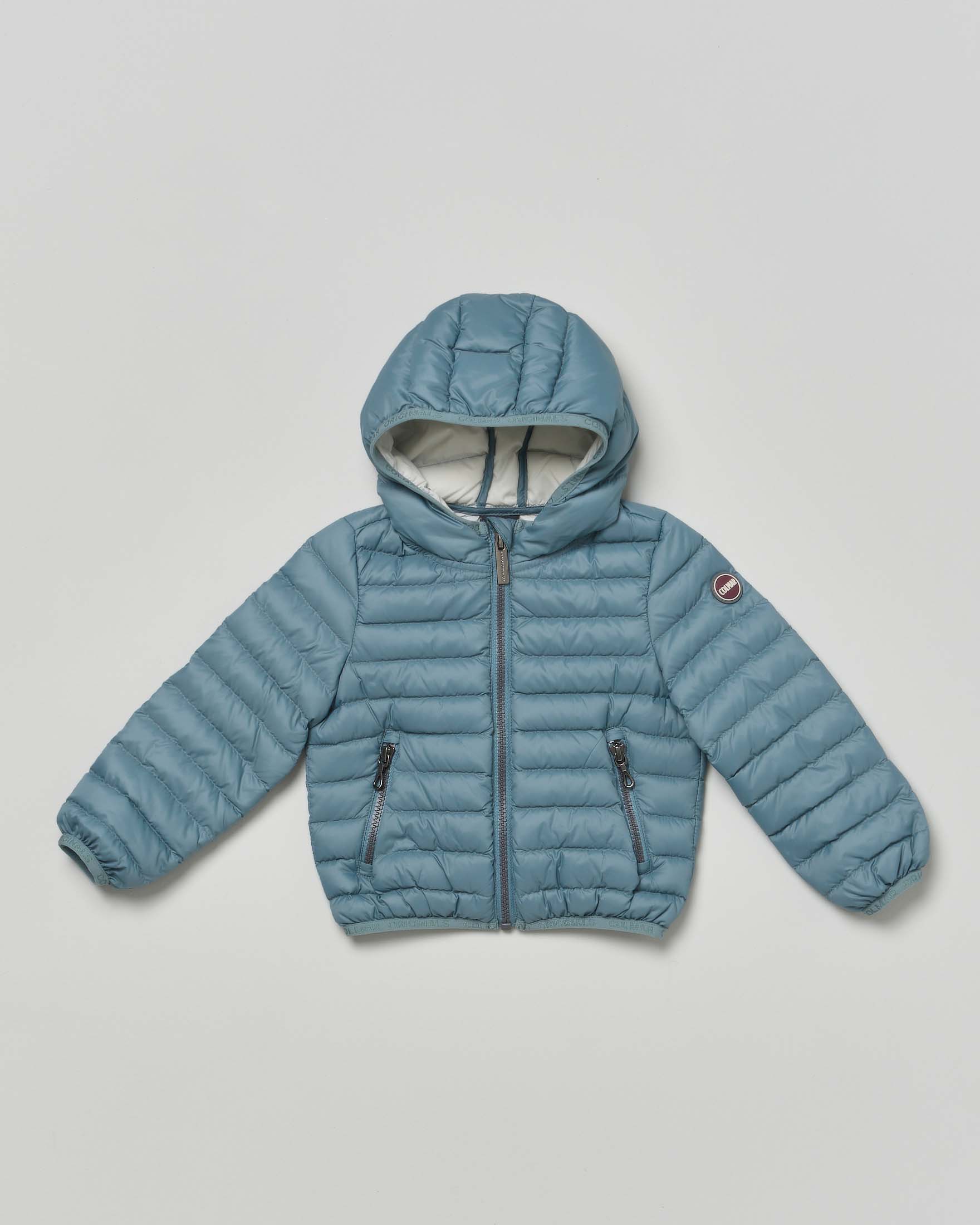 Piumino Colmar azzurro in nylon imbottito e trapuntato con cappuccio