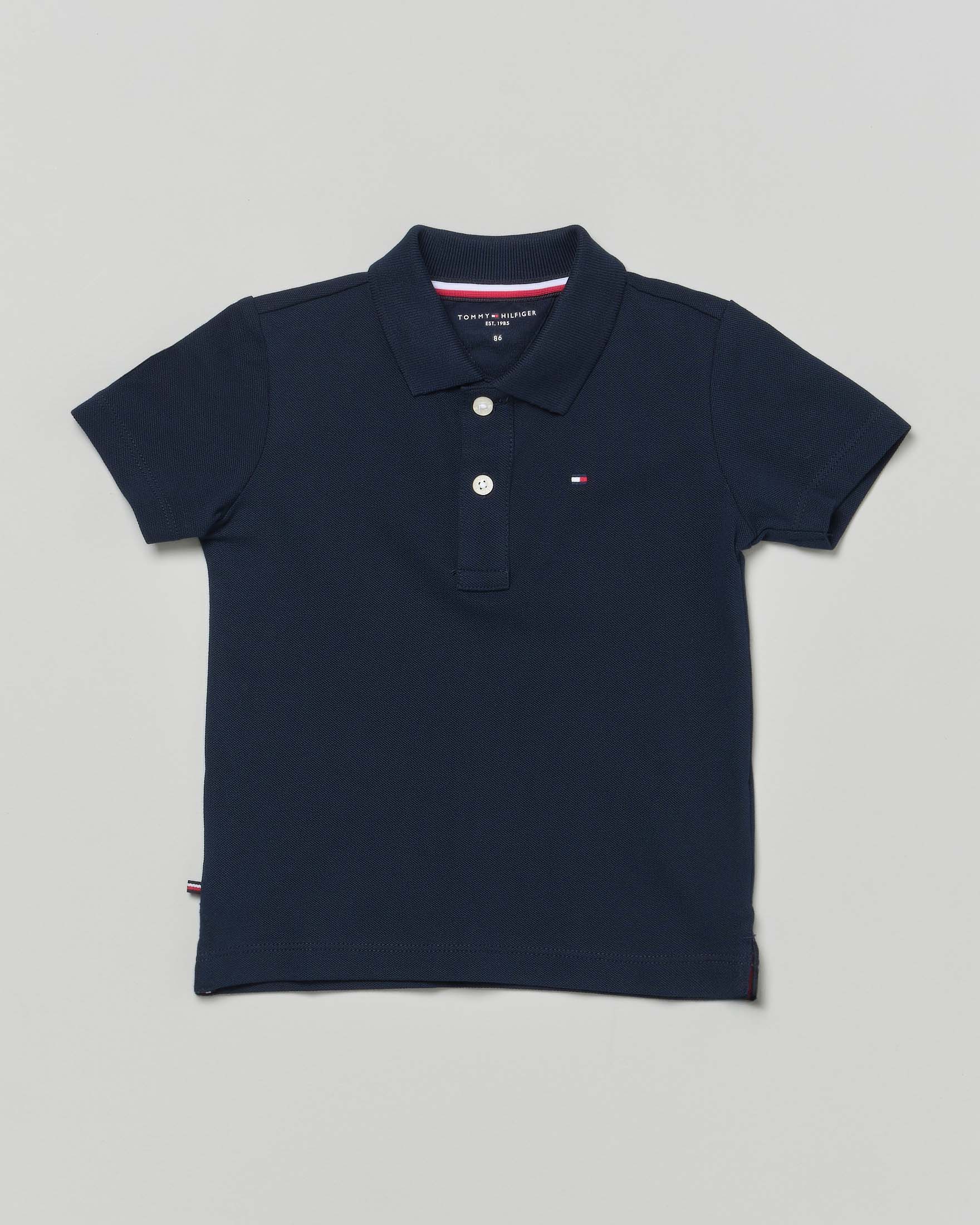 Polo blu in piquet tinta unita con logo bandiera icon