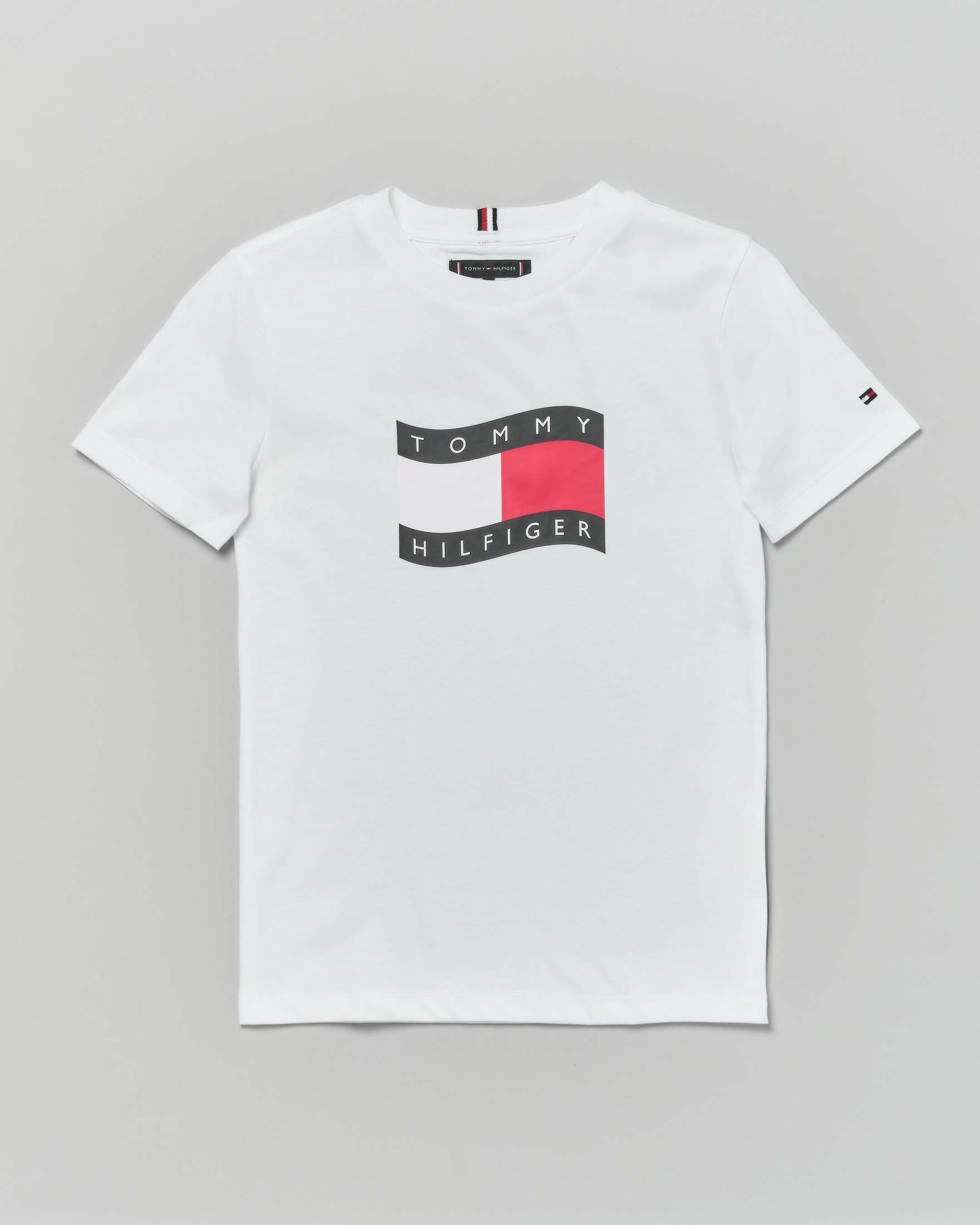 T-shirt Tommy Hilfiger bianca in puro cotone con bendiera logo icon