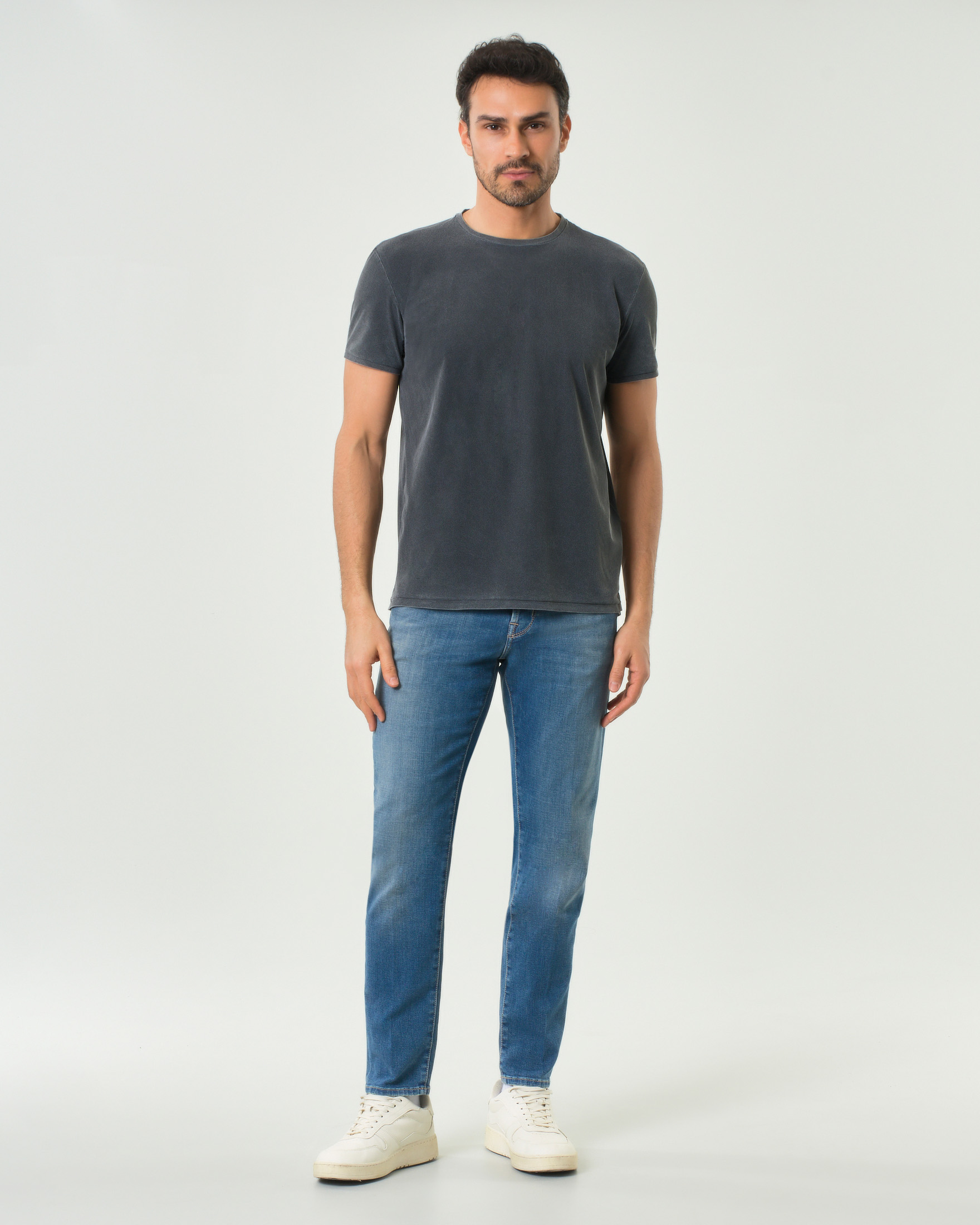Jeans Scott carrot-fit lavaggio medio stone washed in cotone elasticizzato
