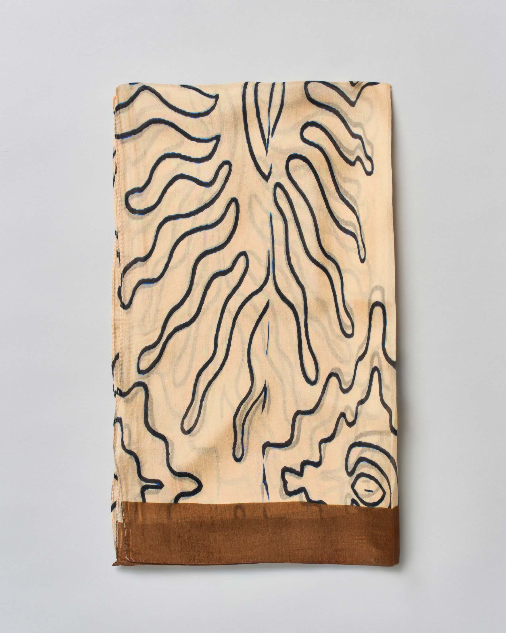 Sciarpa beige in pura seta con bordo coccio e linee graiche nere