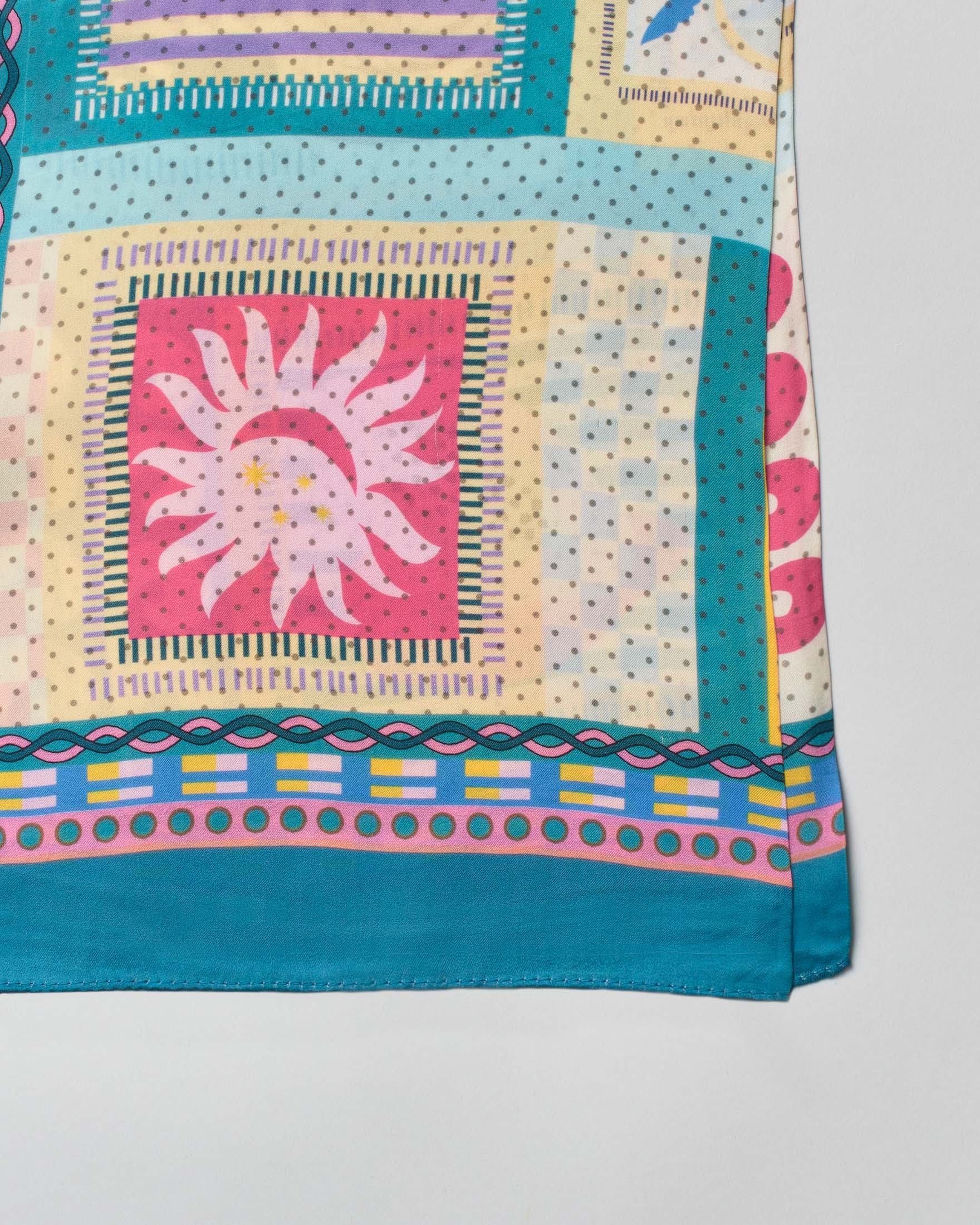 Foulard Pellizzari turchese in modal con stampa tropicale e dettagi geometrici image