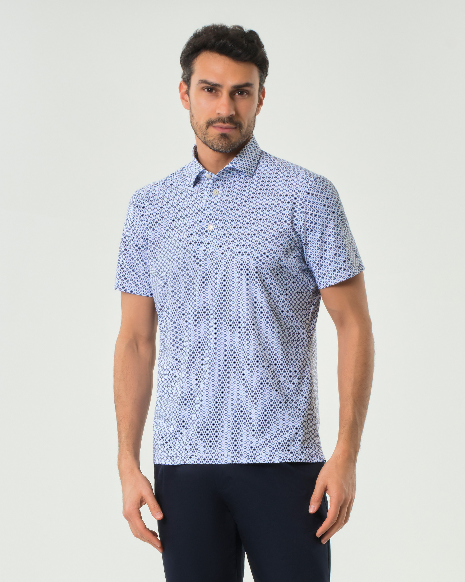 Polo Pellizzari azzurra in tessuto tecnico hyper comfort micro cerchietti