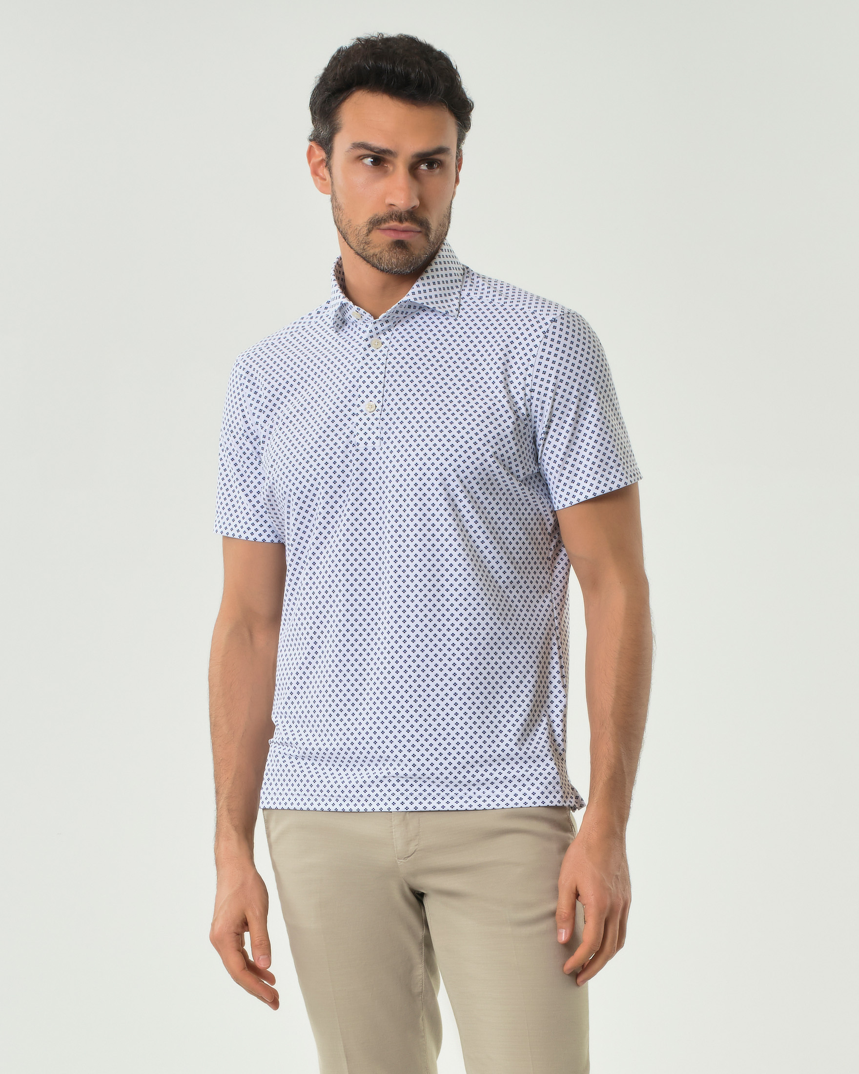 Polo Pellizzari bianca in tessuto tecnico hyper comfort con micro rombetto blu