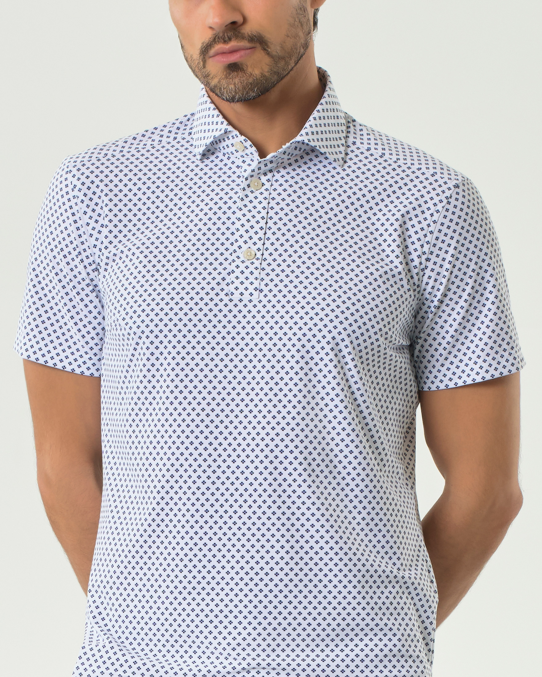 Polo Pellizzari bianca in tessuto tecnico hyper comfort con micro rombetto blu image