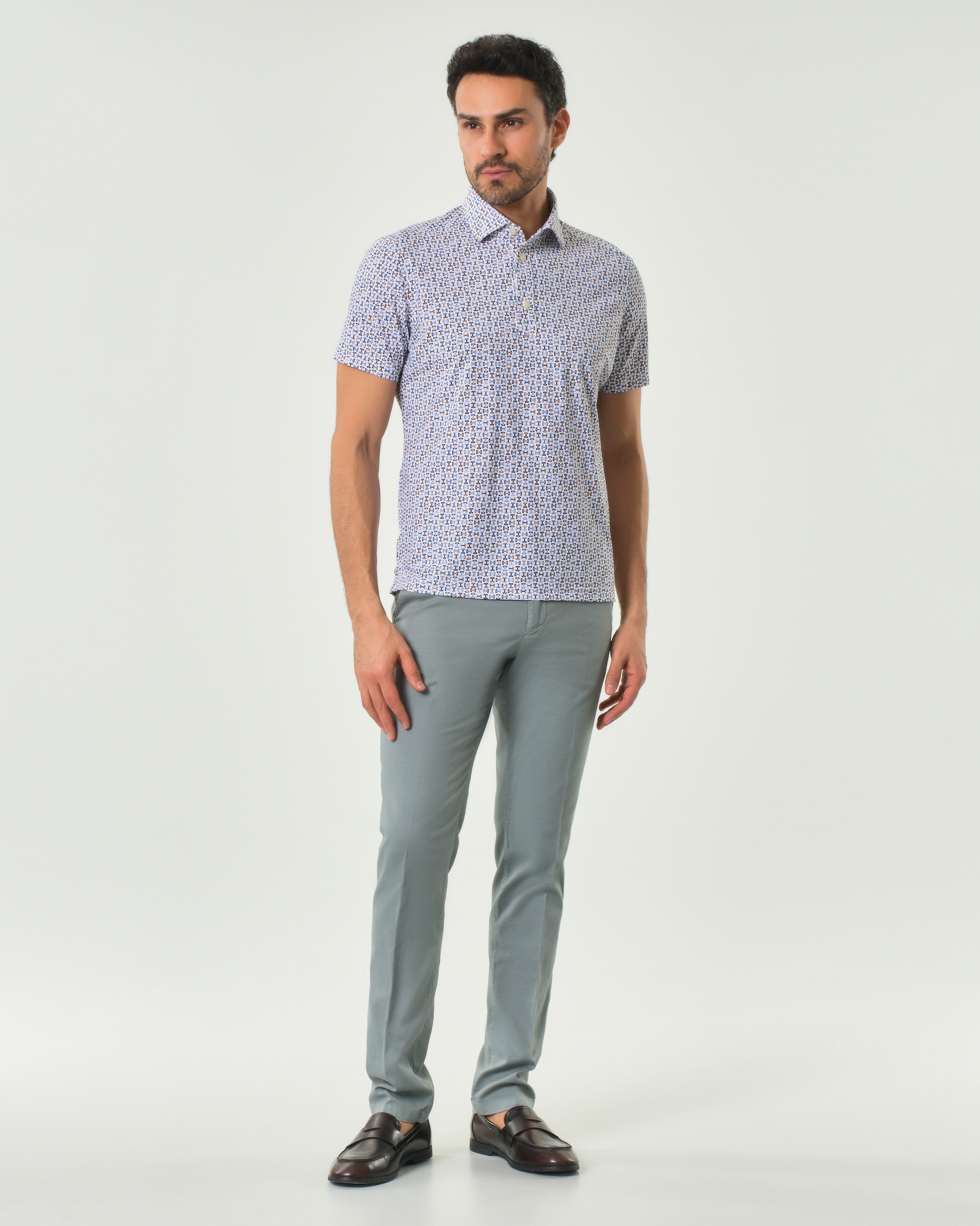 Polo Pellizzari bianca in tessuto tecnico hyper comfort con micro fantasia noce e azzurra image
