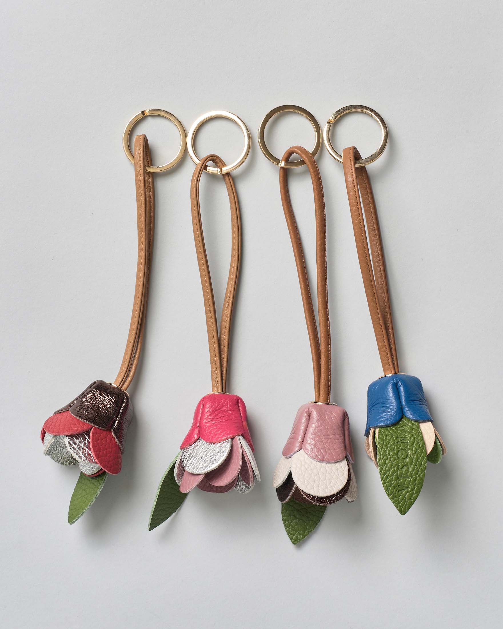 Portachiavi Charm Visonà in pelle a forma di fiore colori assortiti