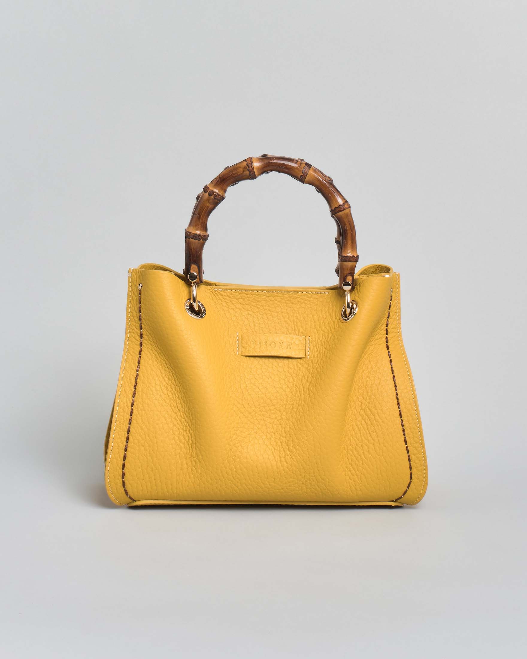 Borsa a spalla Posillipo in pelle martellata giallo e manico in bamboo