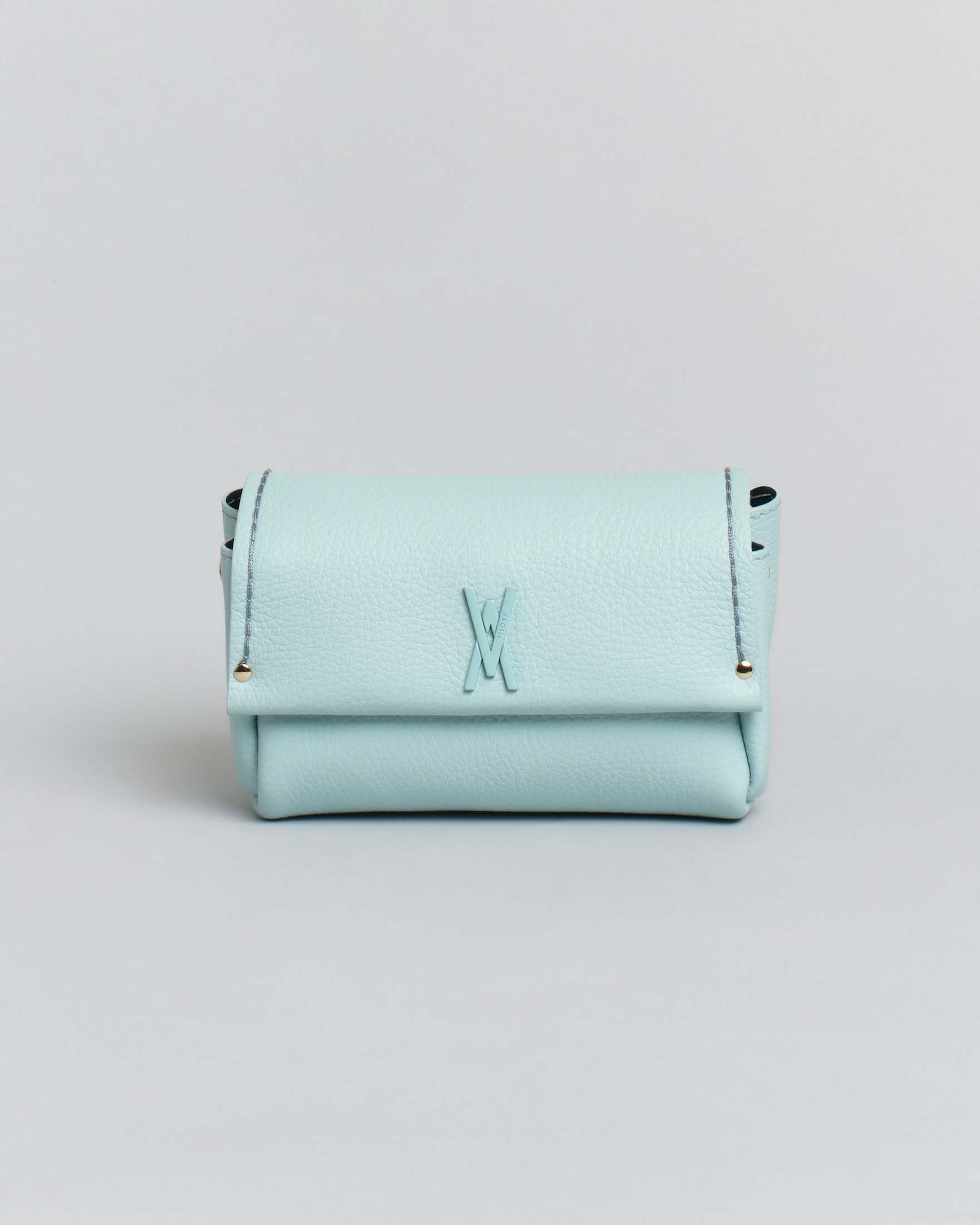 Mini Bag Visonà color acqua in pelle martellata con patta e tracolla removibile