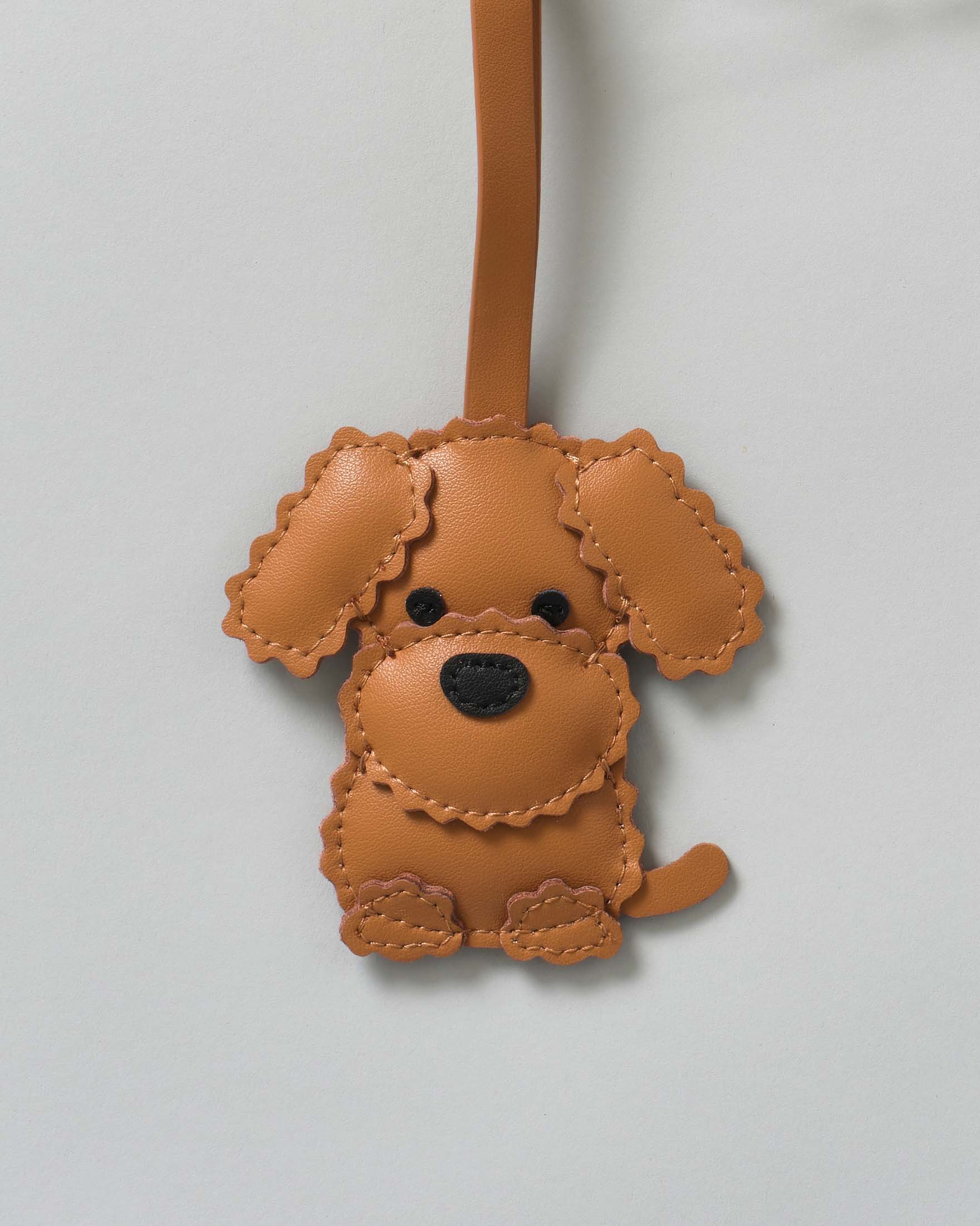 Portachiavi Bag Charm MC2 Saint Barth a forma di cagnolino in pelle cuoio con targa logo image