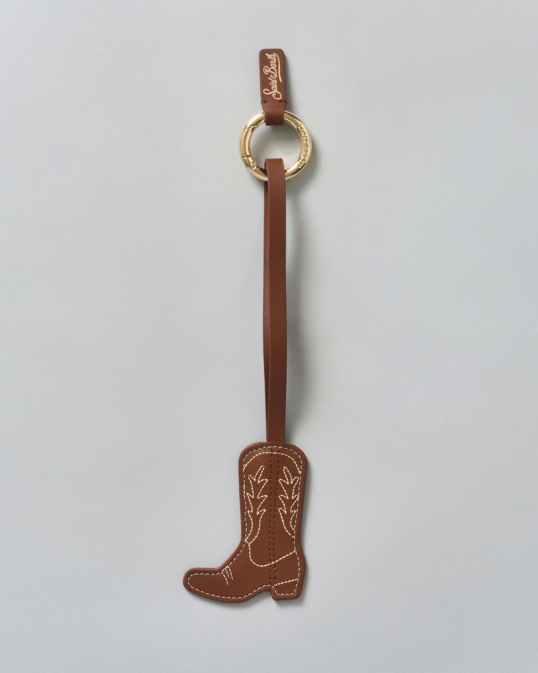 Portachiavi Bag Charm a forma di stivale texano in pelle marrone con anello logato
