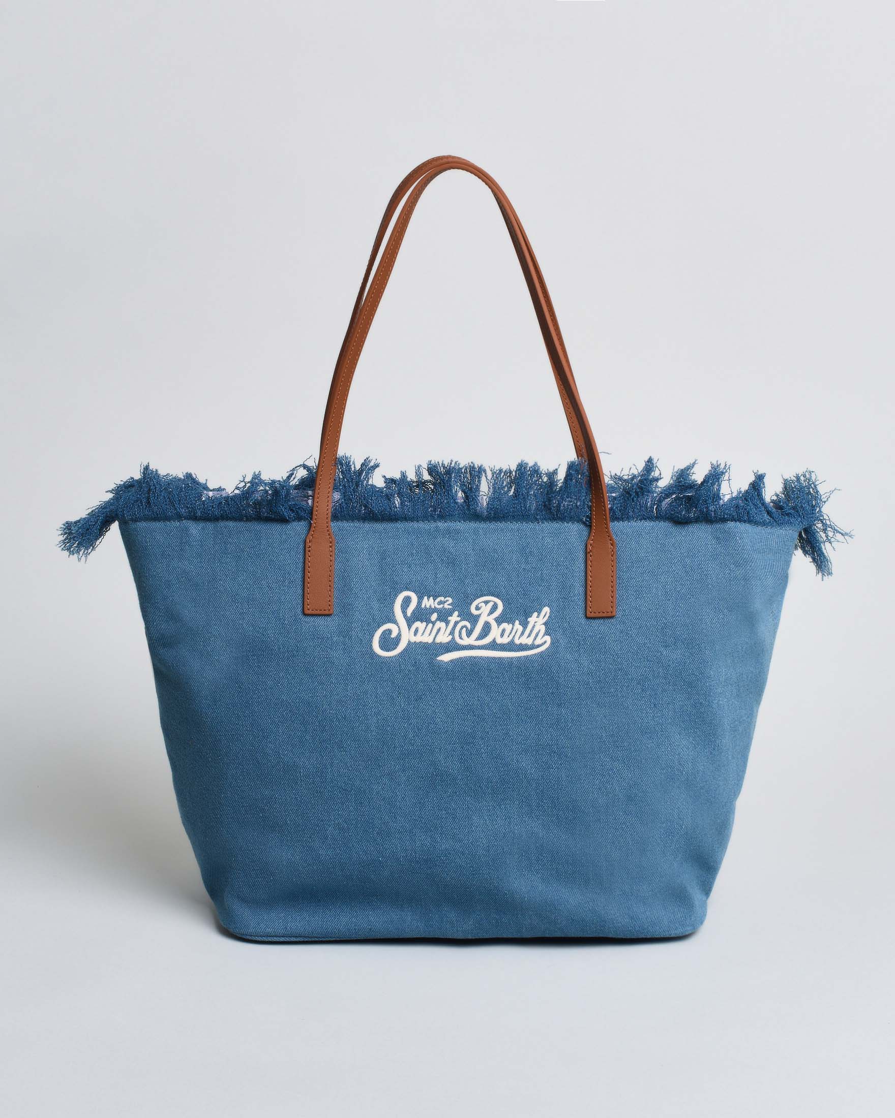 Borsa City Regular in denim di cotone blu con chiusura a zip e frange