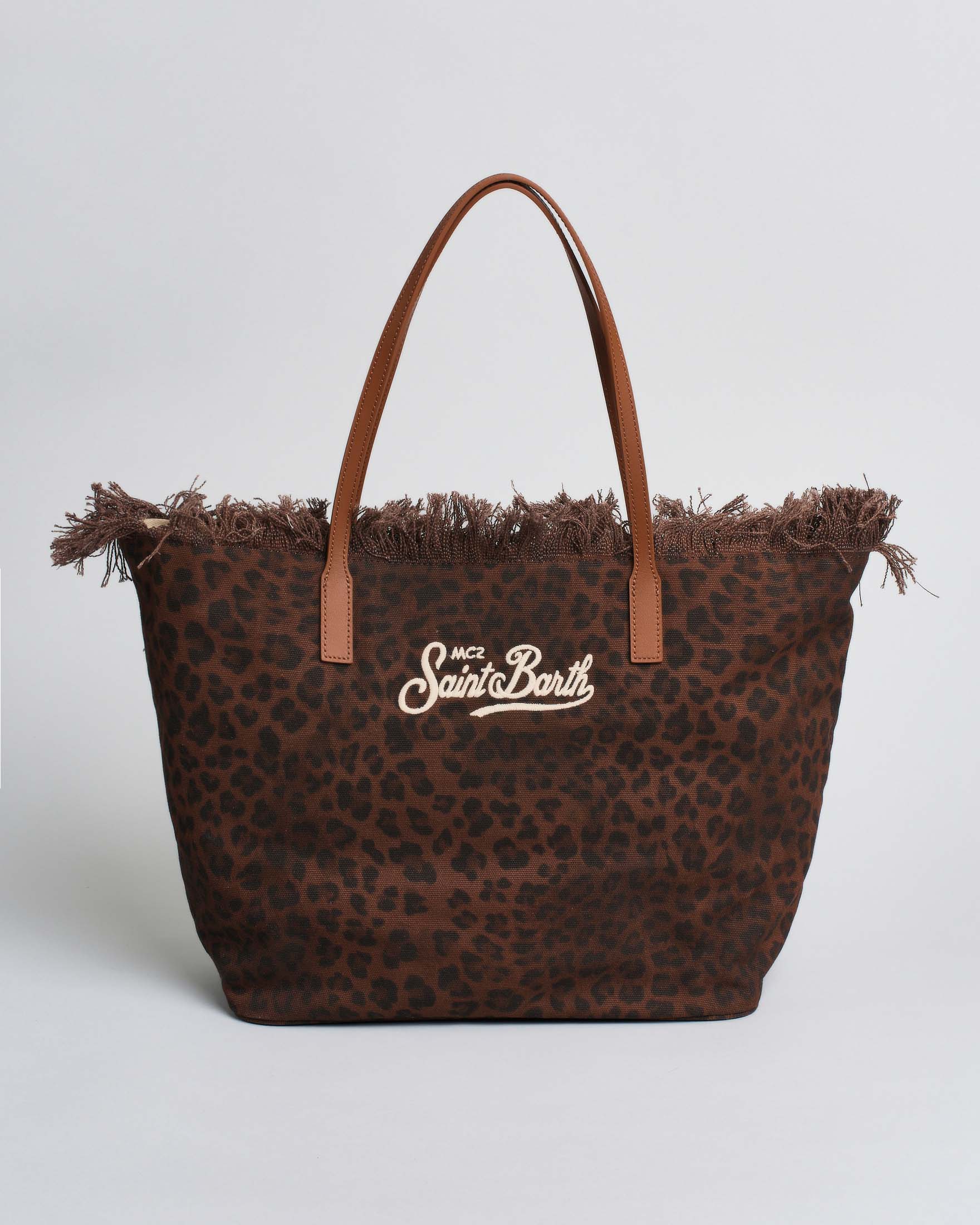 Borsa City Medium in cotone leopardato scuro con chiusura a zip e frange