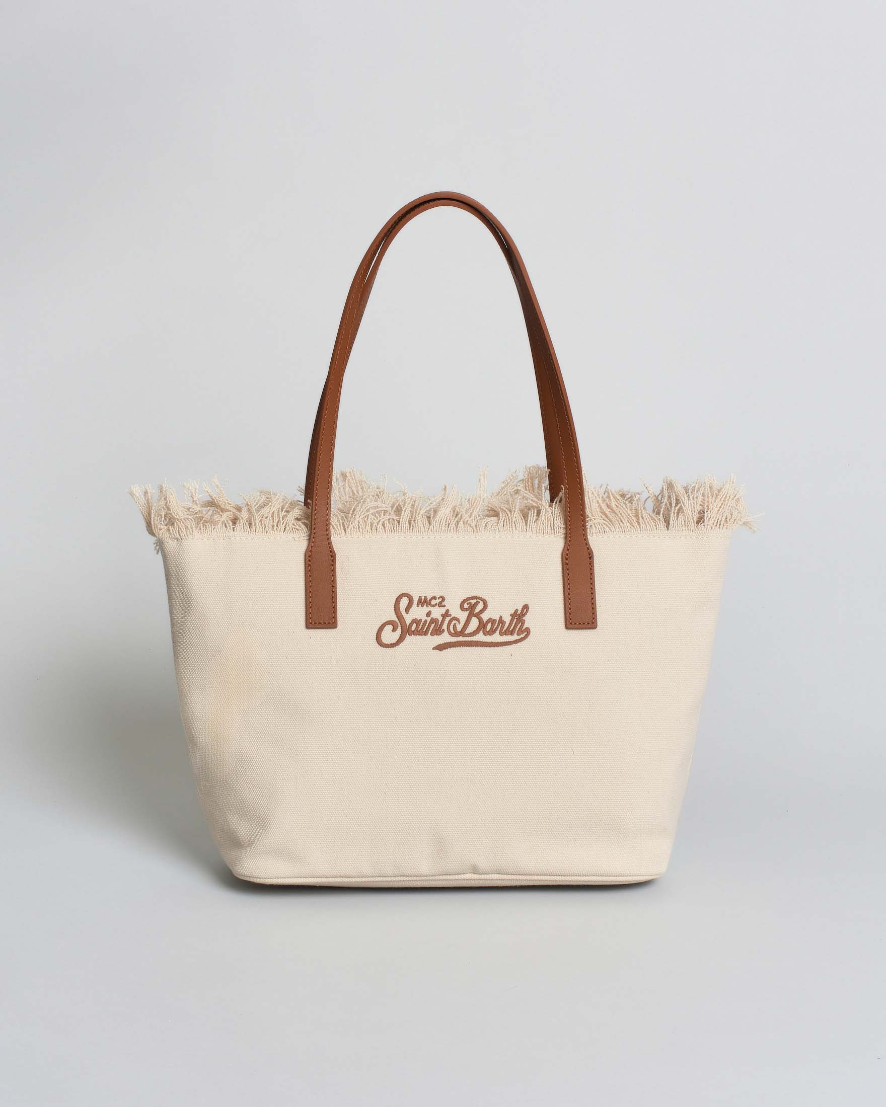 Borsa City Medium in cotone écru con chiusura a zip e frange