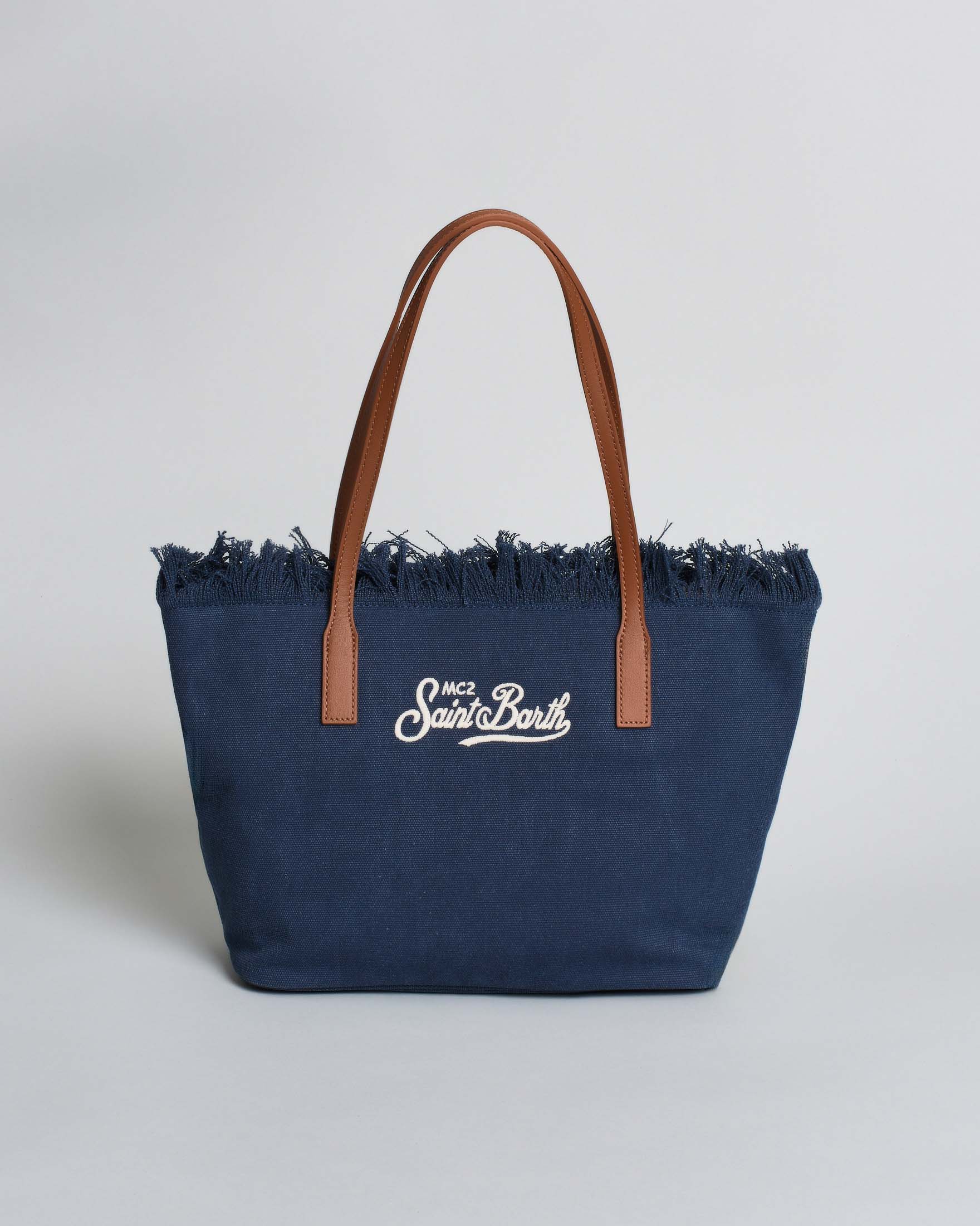 Borsa City Medium in cotone blu con chiusura a zip e frange