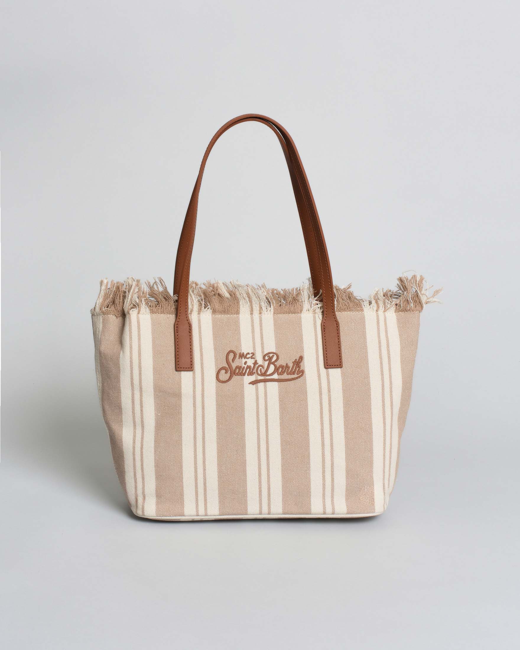 Borsa City Medium in canvas a righe beige con chiusura a zip e frange