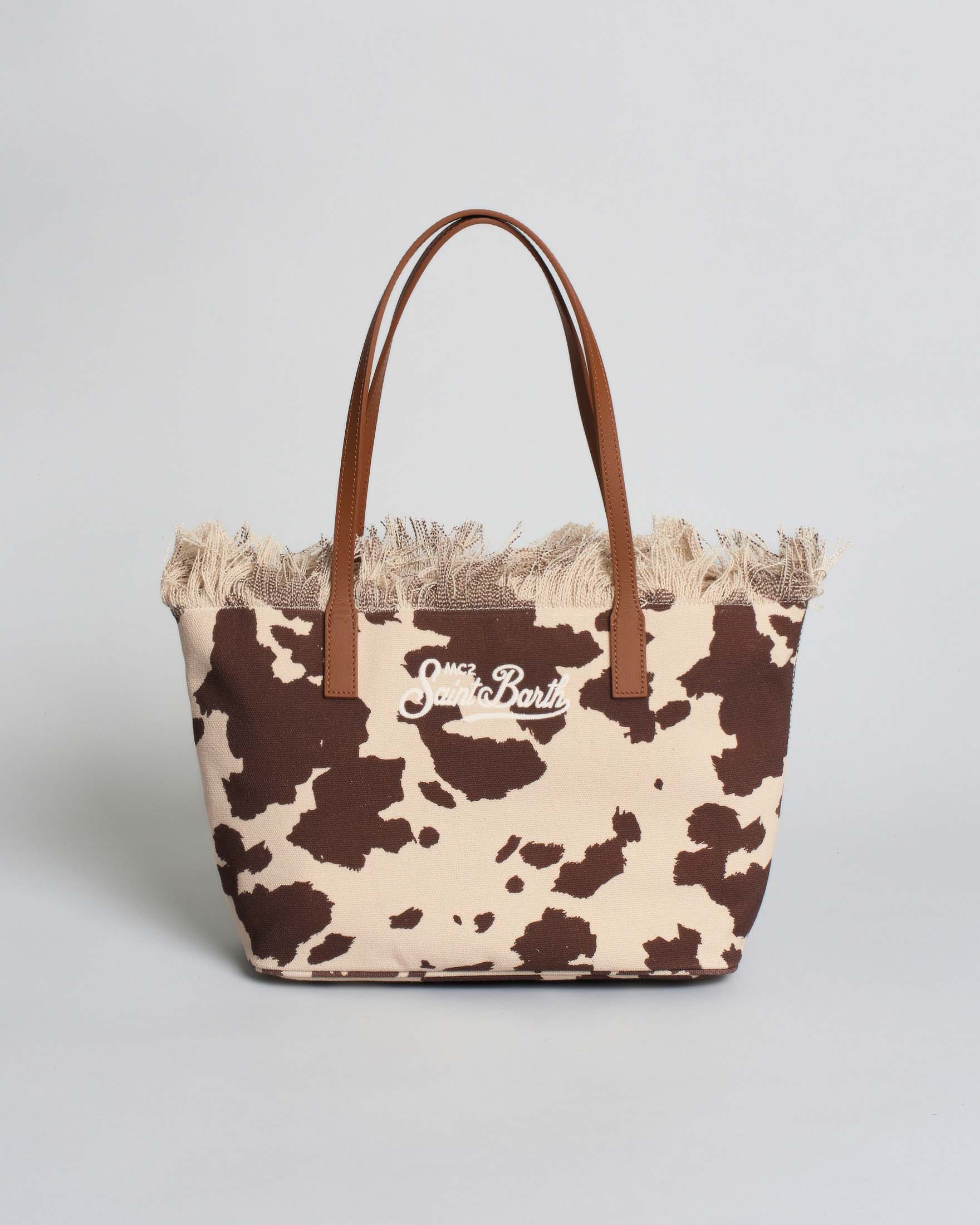 Borsa City Medium in canvas cow print con chiusura a zip e frange