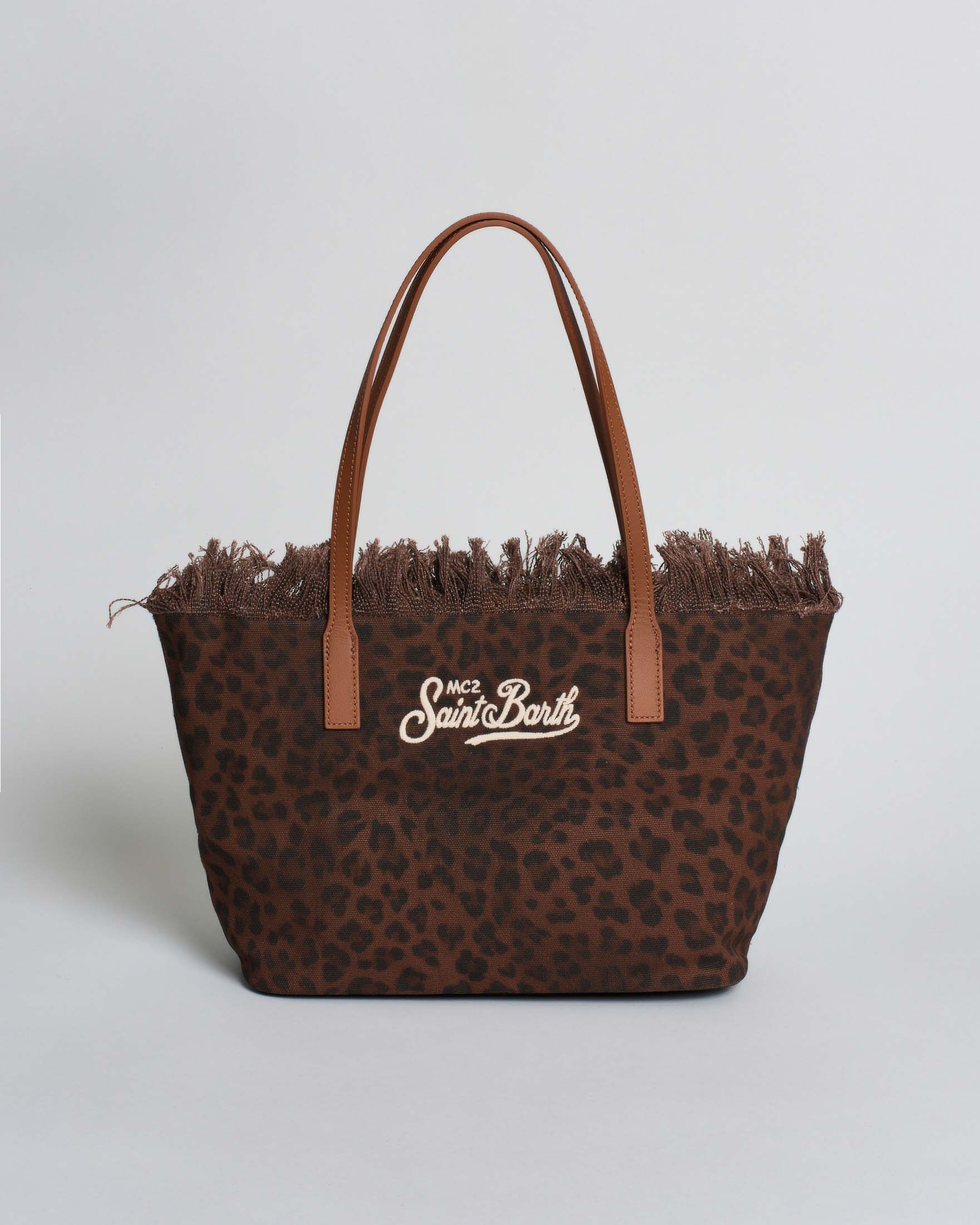 Borsa City Medium in canvas leopardata con chiusura a zip e frange