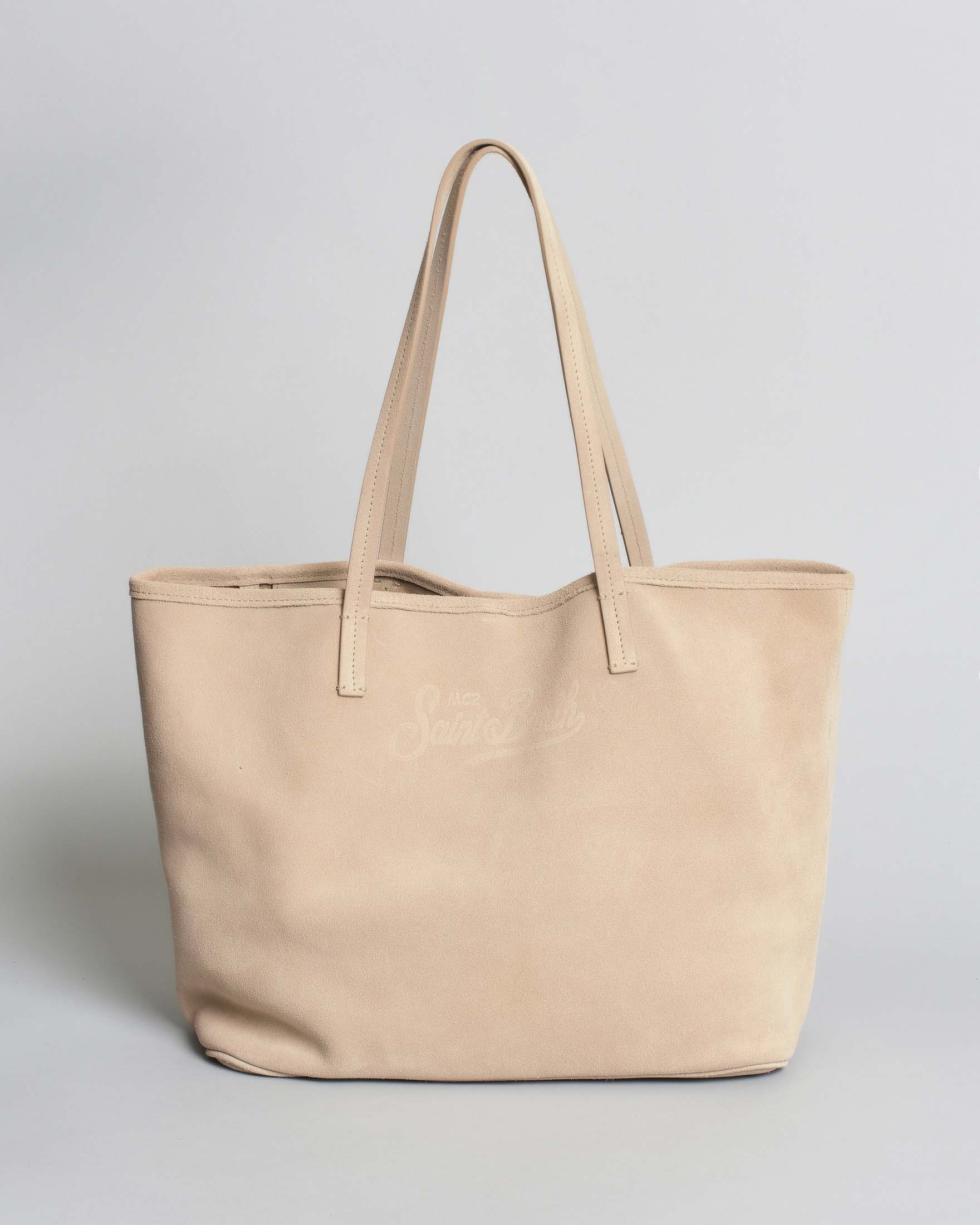 Borsa City Regular in suede beige con chiusura a zip e frange