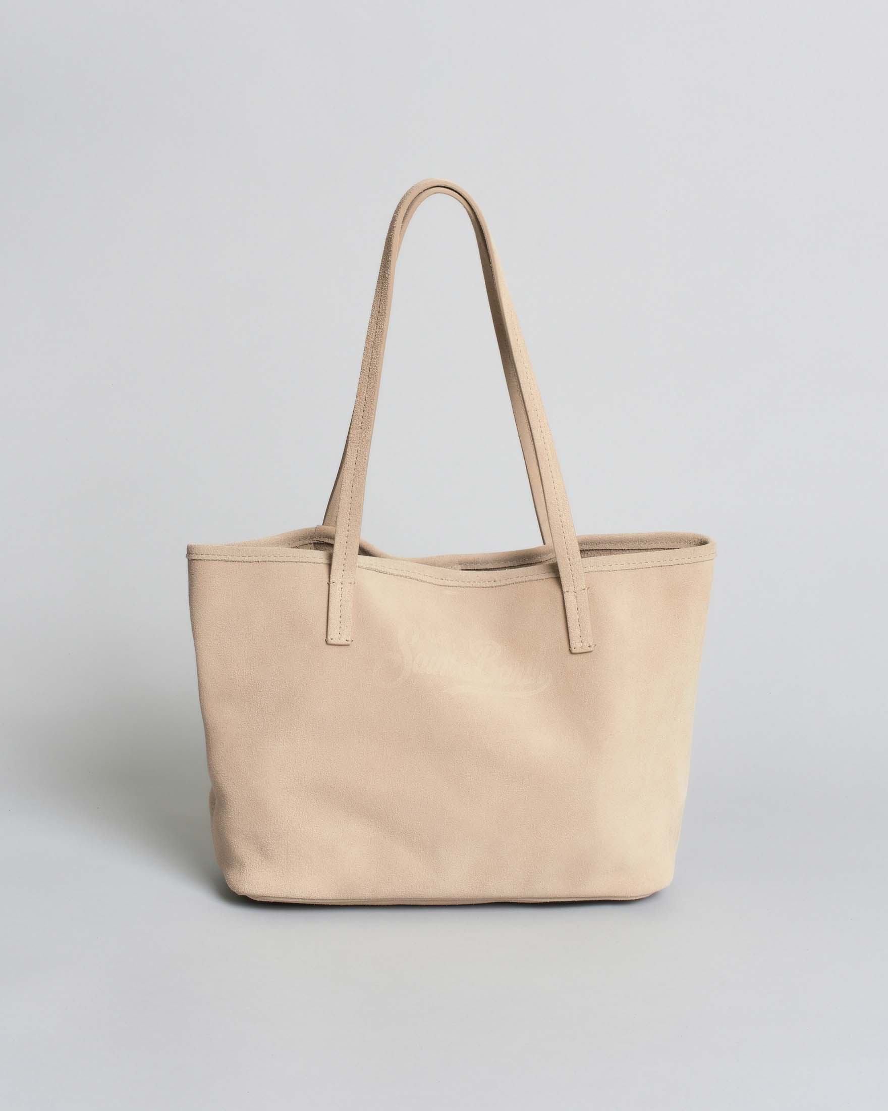 Borsa City Medium in suede beige con chiusura a zip e doppio manico lungo scamosciato
