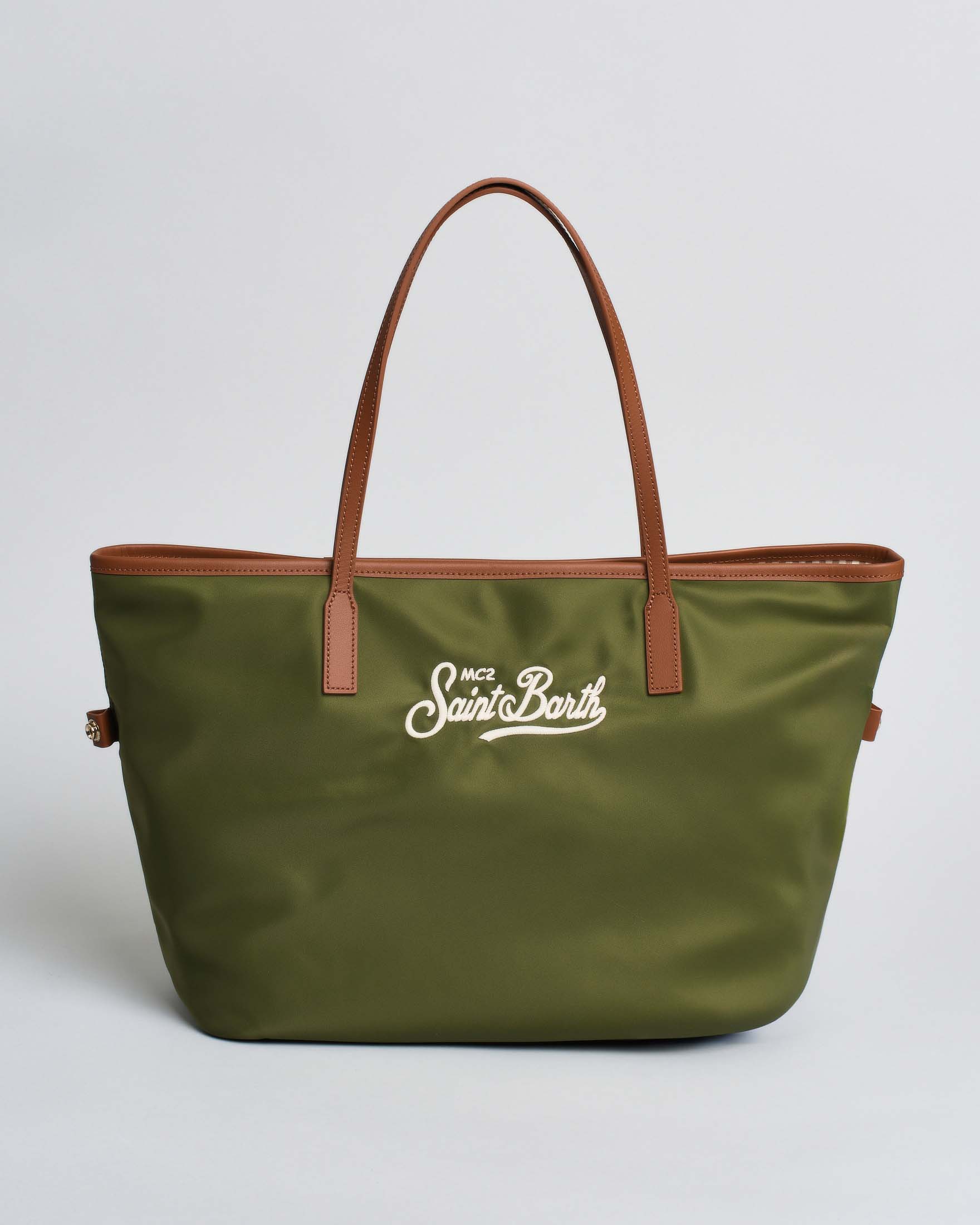 Borsa City in nylon verde militare con chiusura a zip e doppio manico lungo in pelle