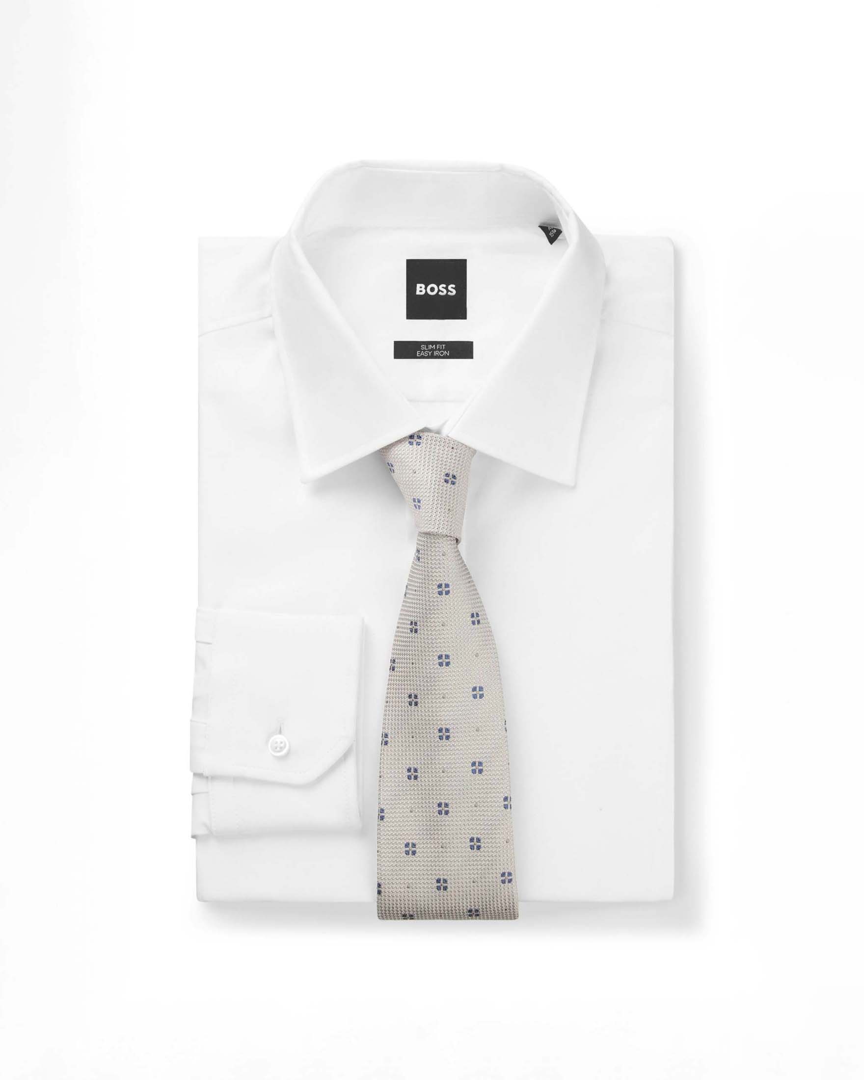 Cravatta Boss panna in pura seta micro armatura con micro fiorellino blu image