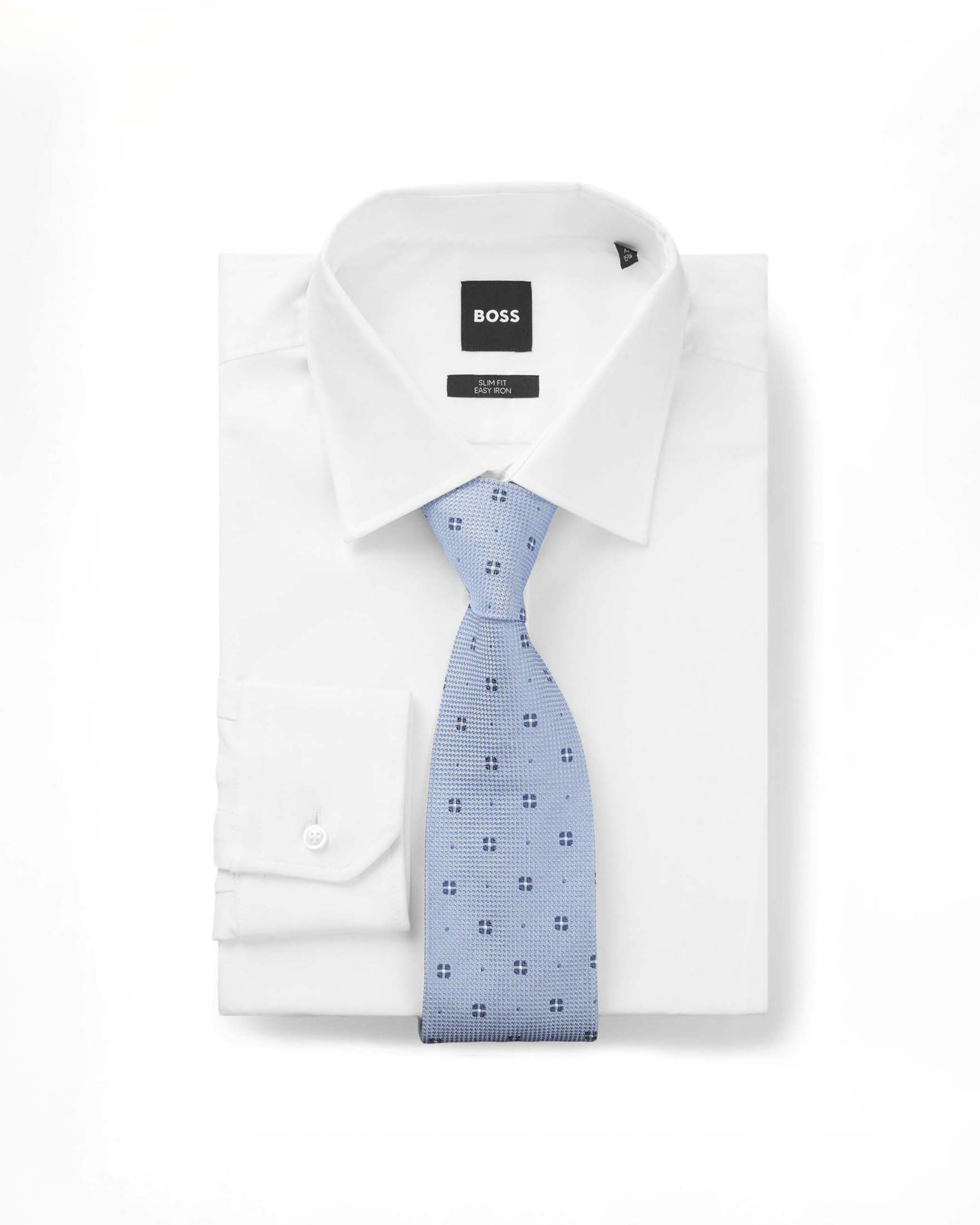 Cravatta Boss azzurra in pura seta micro armatura con micro fiorellino blu image