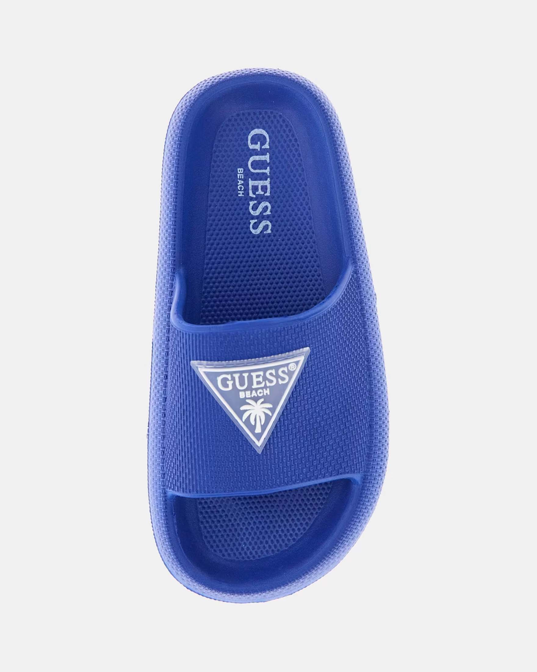 Ciabatte Guess blu in gomma con logo a triangolo image