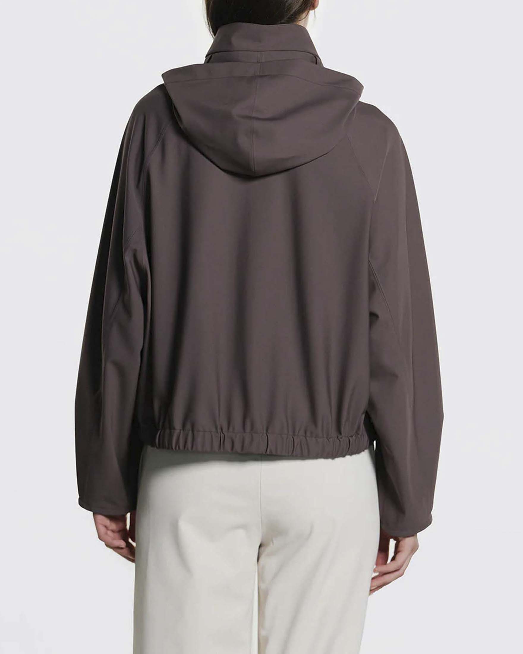 Giacca corta Clove Duno marrone in tessuto tecnico stretch con cappuccio regolabile