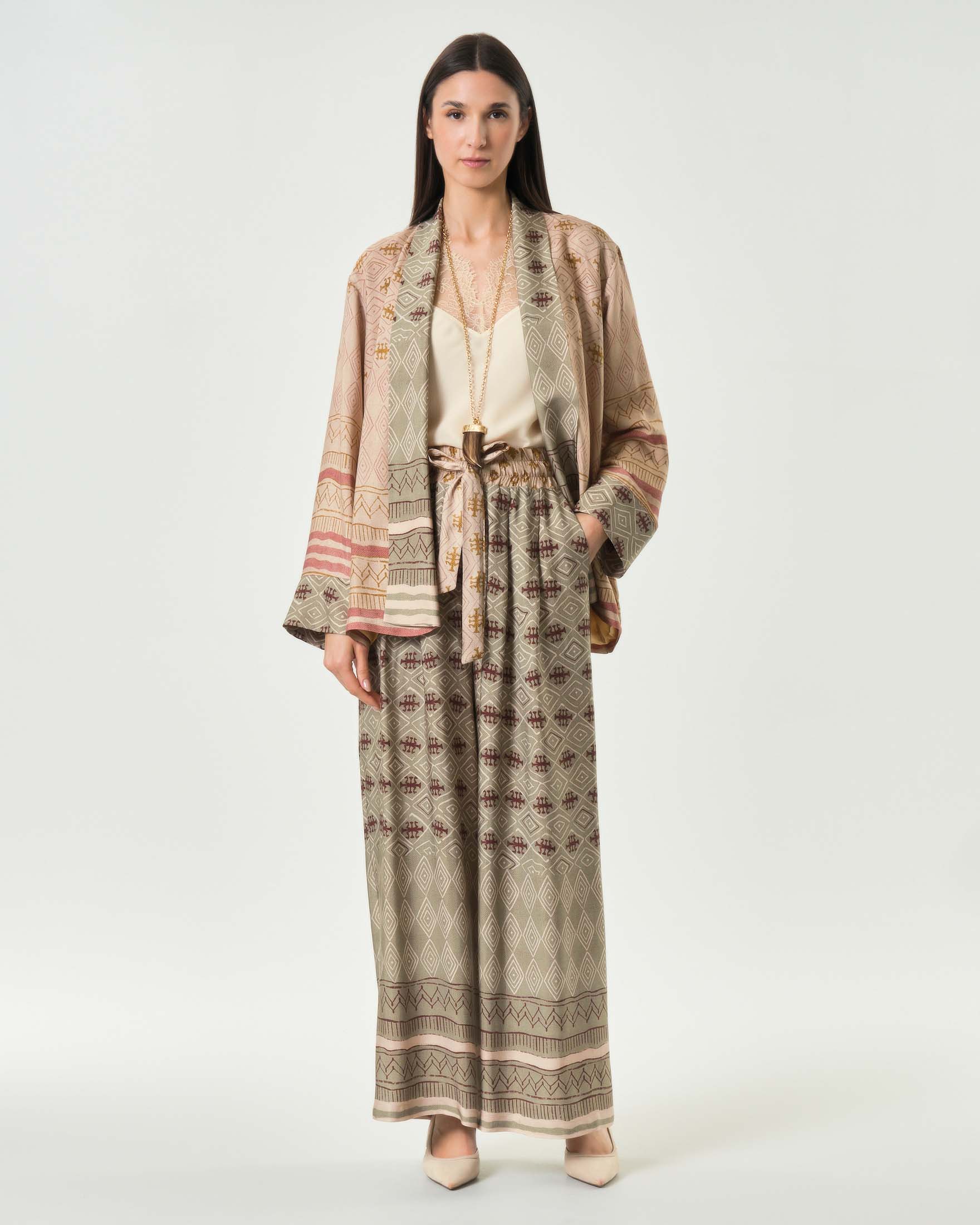 Pantaloni palazzo Wu'Side color salvia in raso di viscosa con stampa geometrica e vita elasticizzata