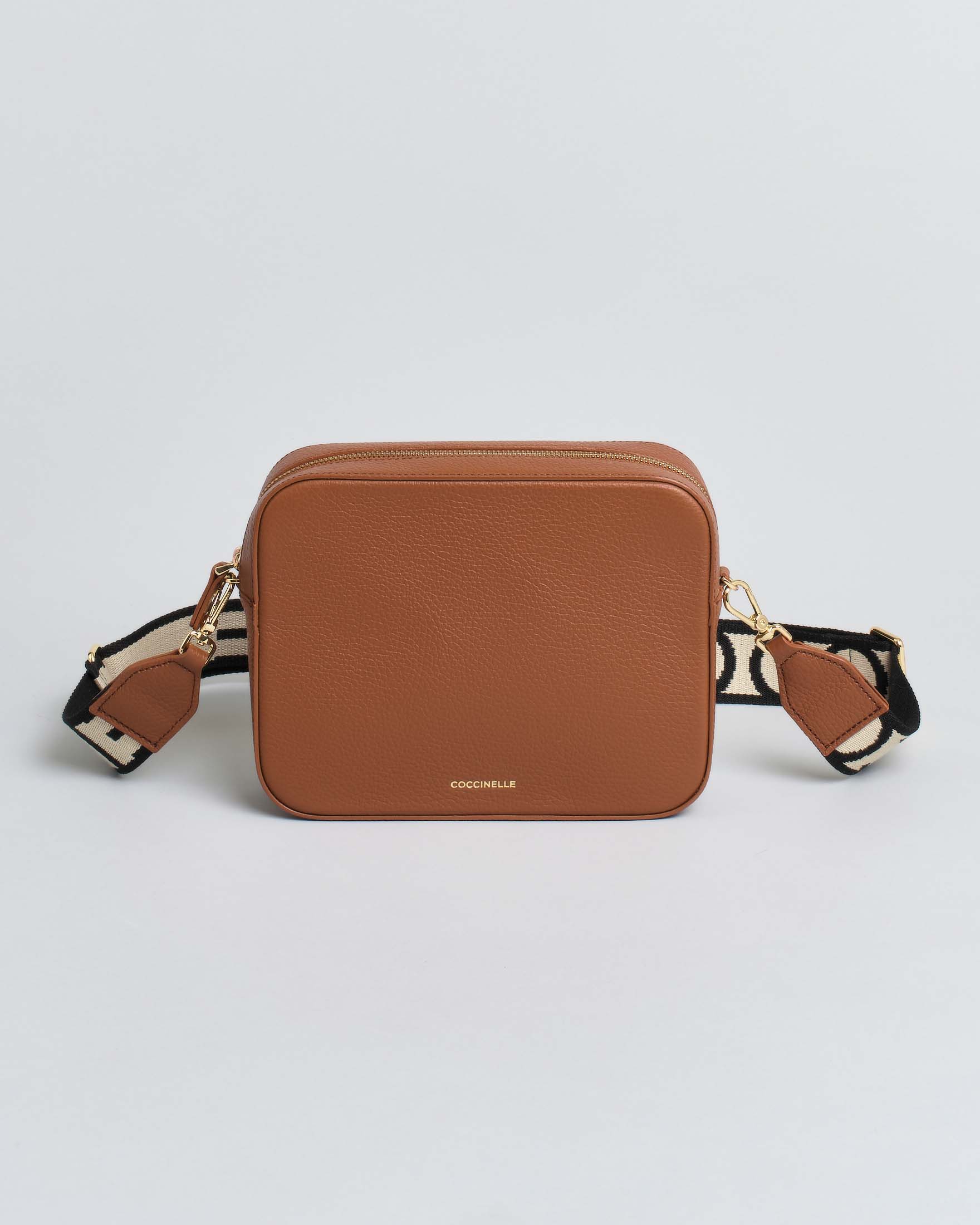 Borsa a tracolla Tebe Coccinelle in pelle cognac double-face con tracolla removibile in tessuto