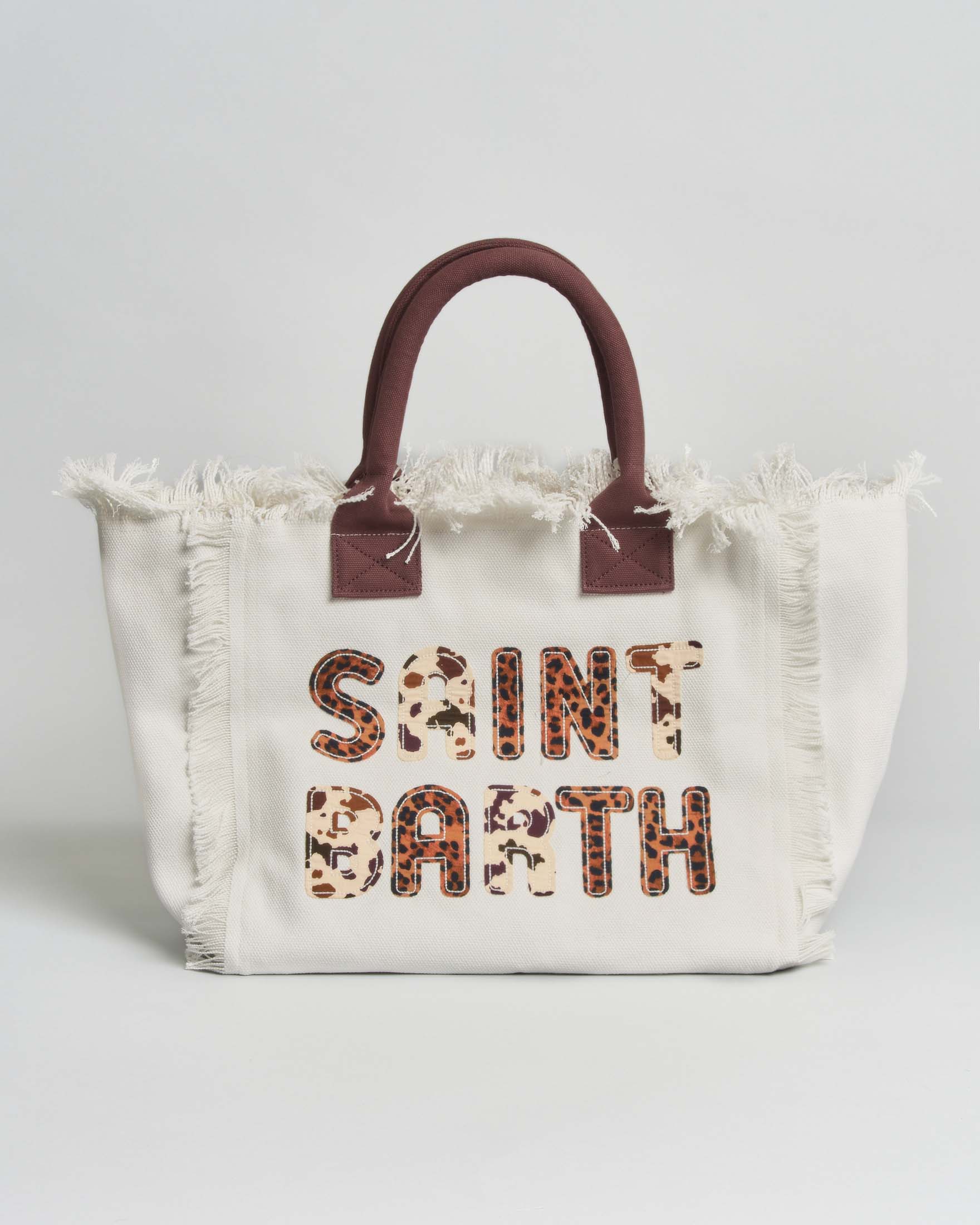 Borsa Vanity MC2 Saint Barth bianca in cotone con patch logo in stampa animalier e manici marroni