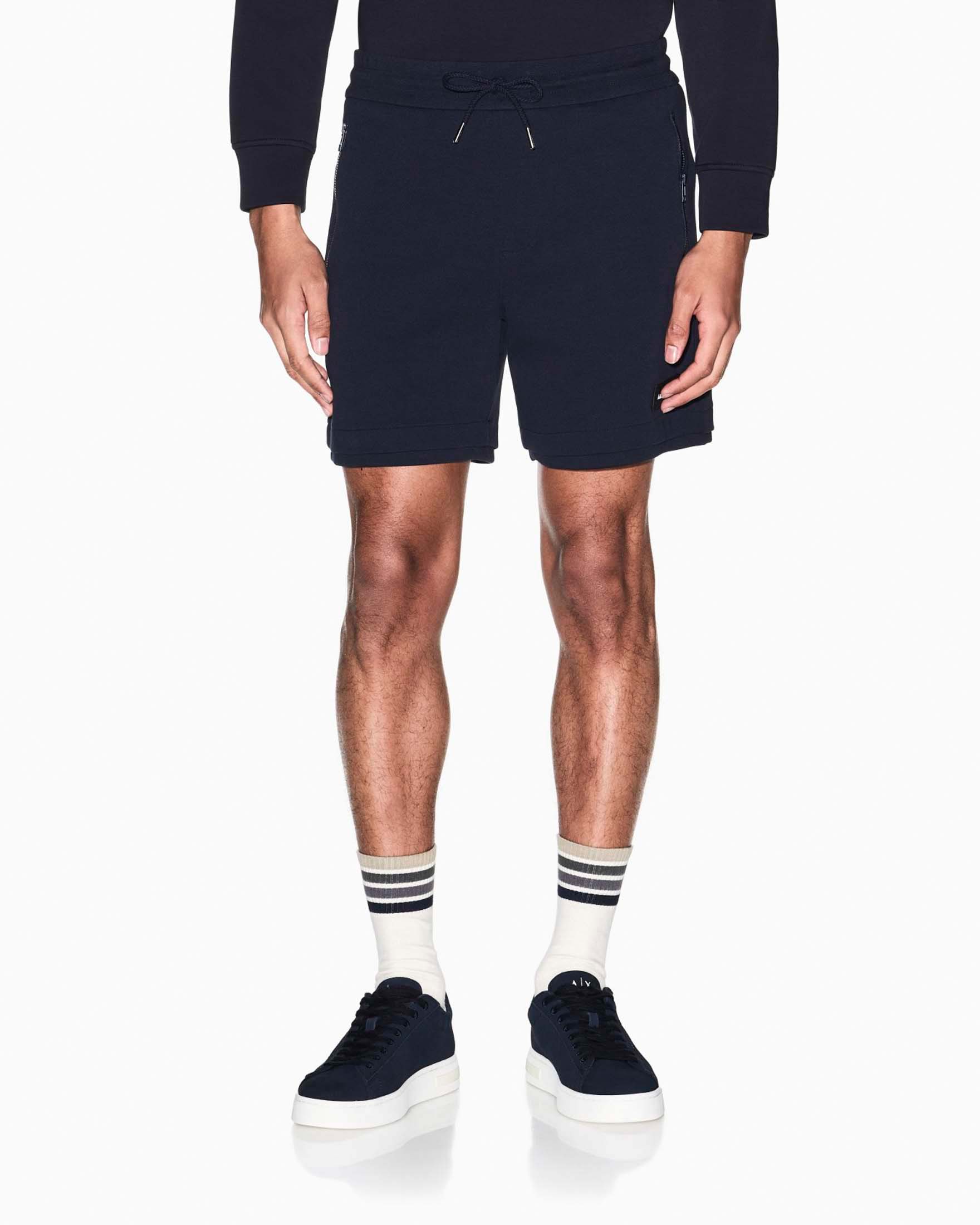 Bermuda Armani Exchange blu scuro in felpa di misto cotone con patch logo image
