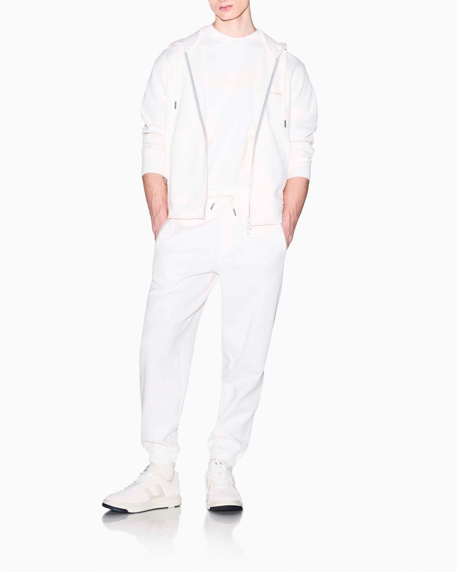 Pantaloni jogger Exchange bianchi in misto cotone con logo cucito