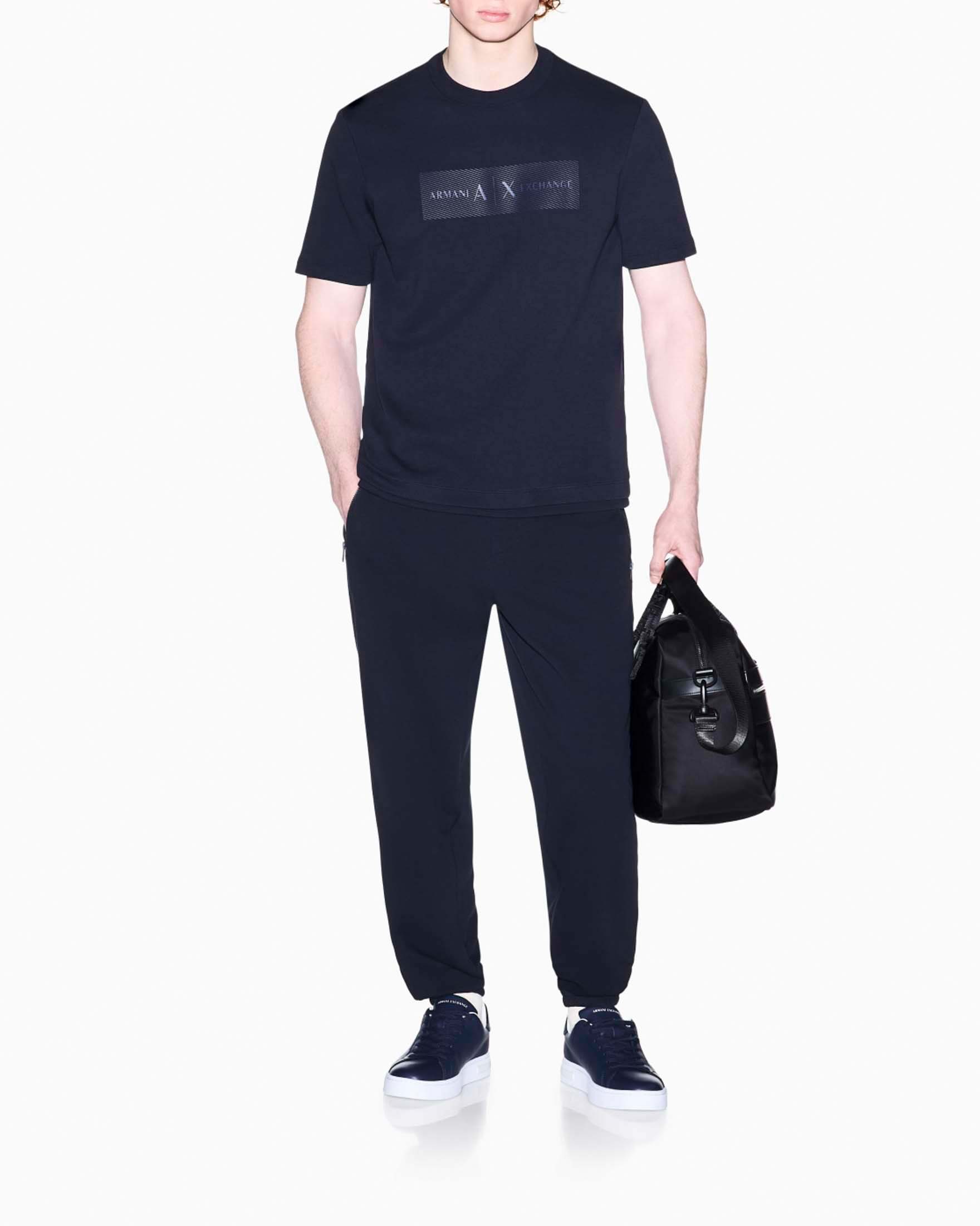 Pantaloni jogger Exchange blu in misto cotone con logo cucito