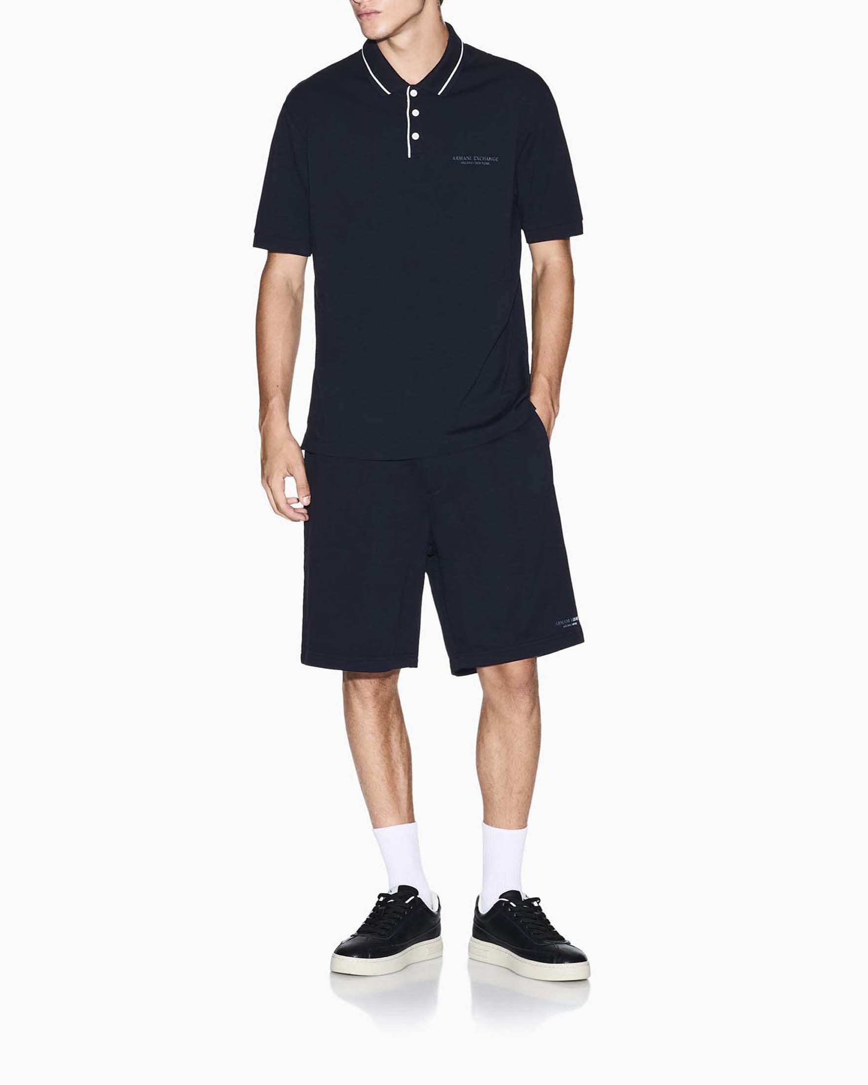 Polo Exchange blu in cotone stretch con piping a contrasto