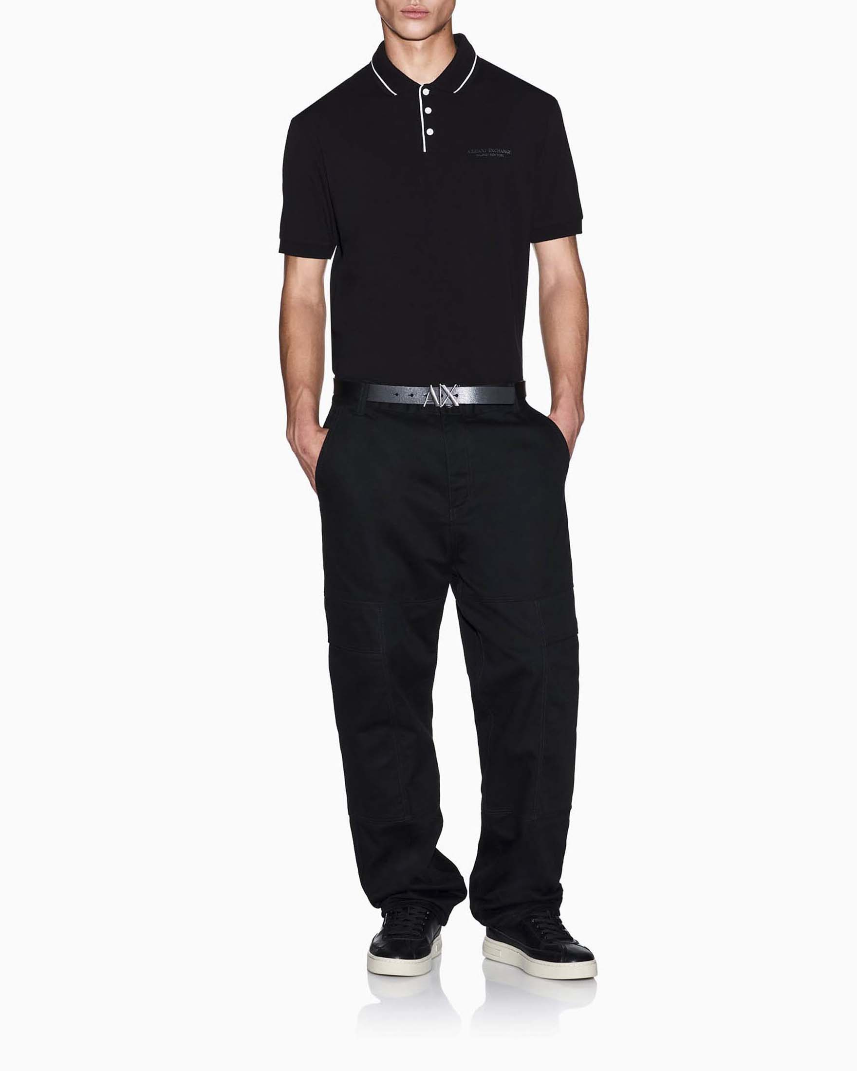 Polo Exchange nera in cotone stretch con piping a contrasto