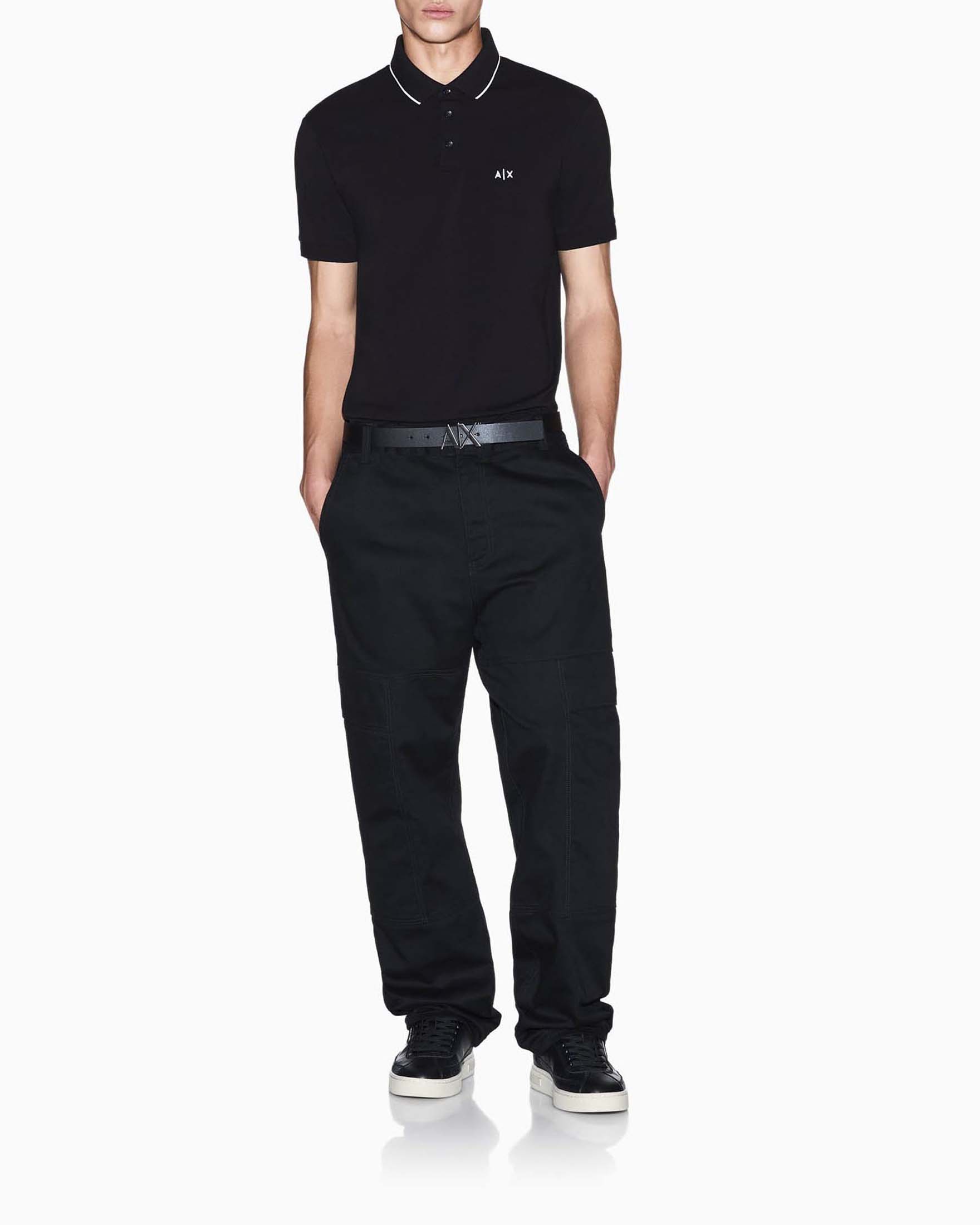 Polo Exchange nera in cotone elasticizzato con bordino e logo ricamato