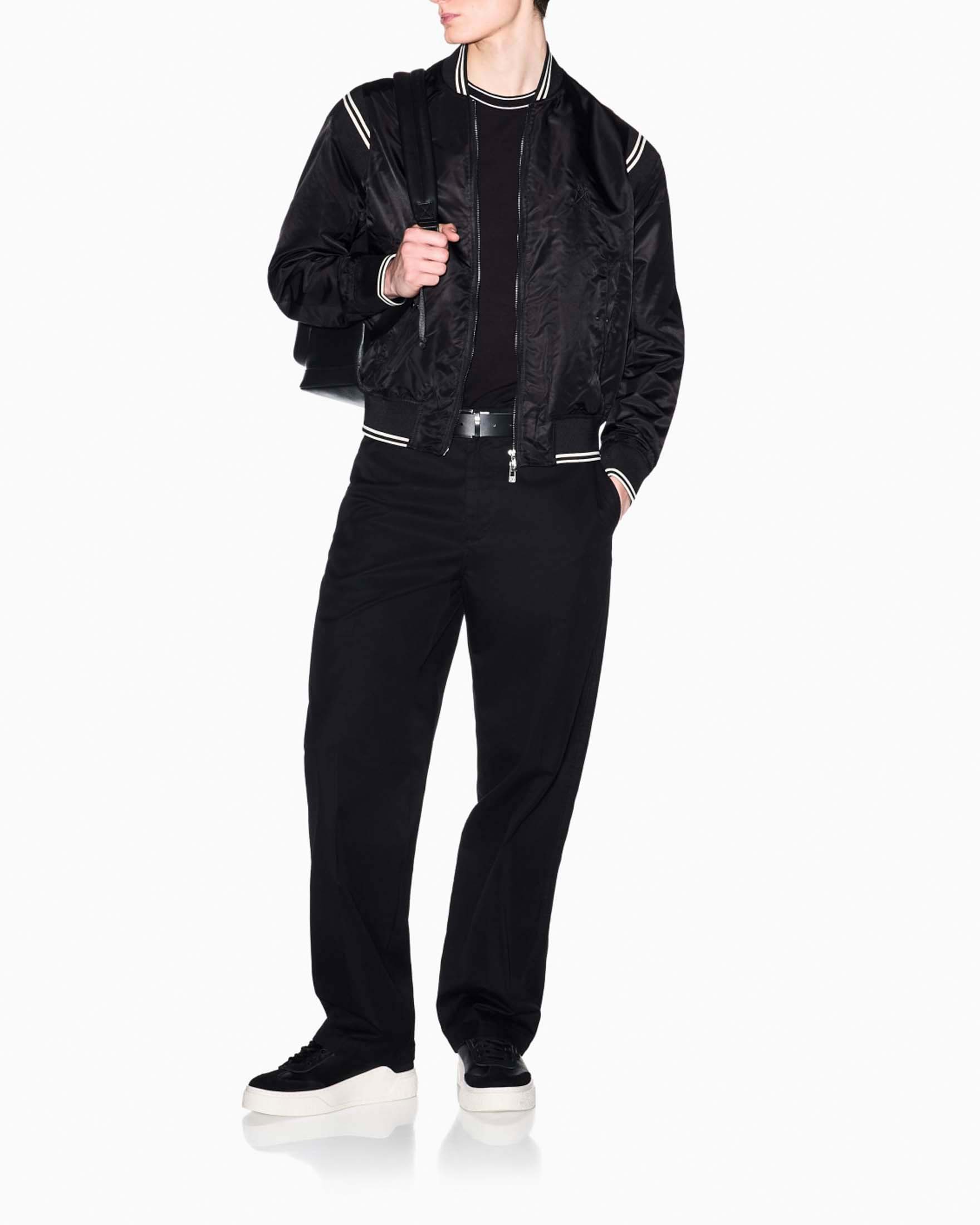 T-shirt mezza manica Exchange nera in viscosa stretch con bordino e logo ricamato