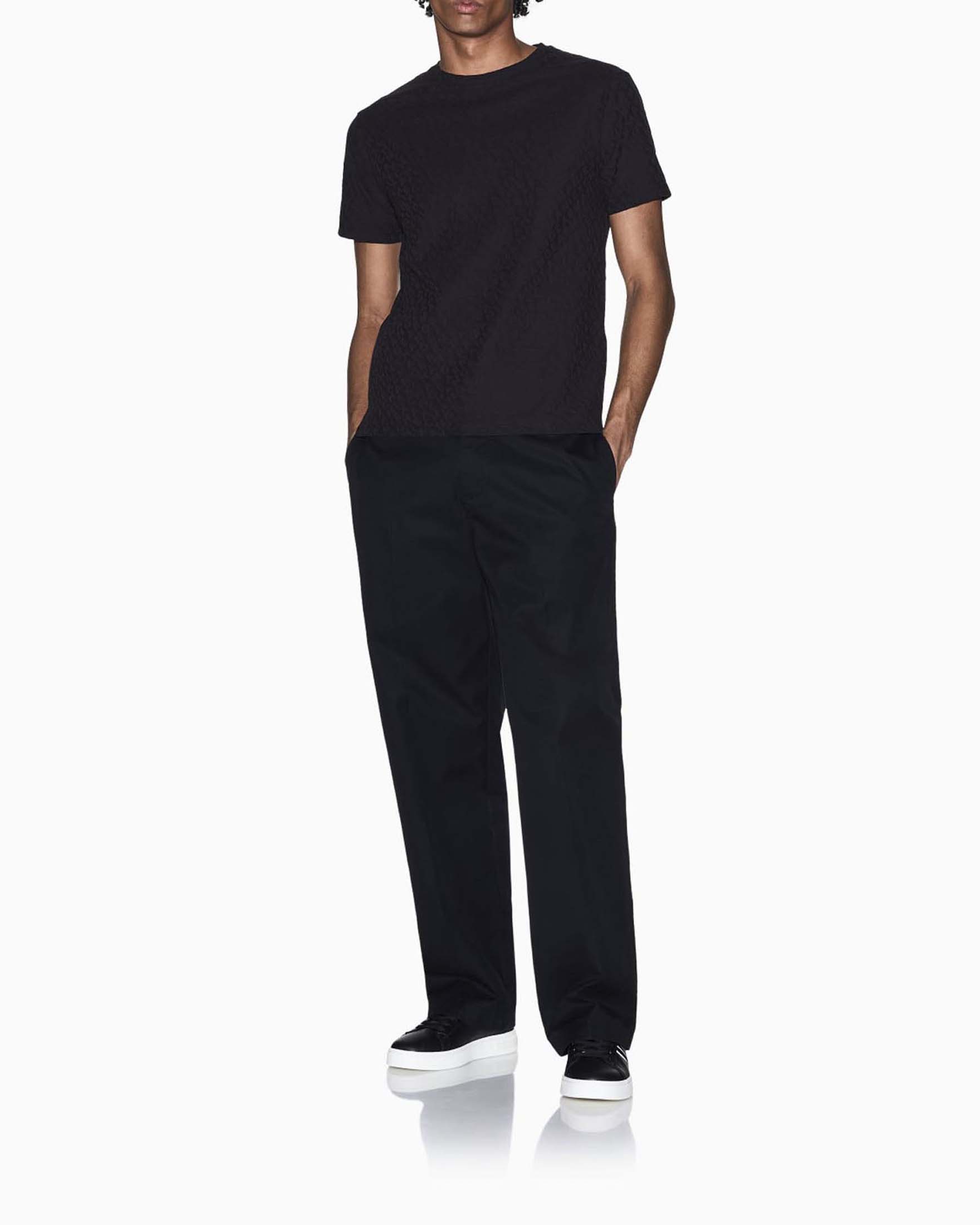 T-shirt Armani Exchange nera in cotone con logo jacquard all-over