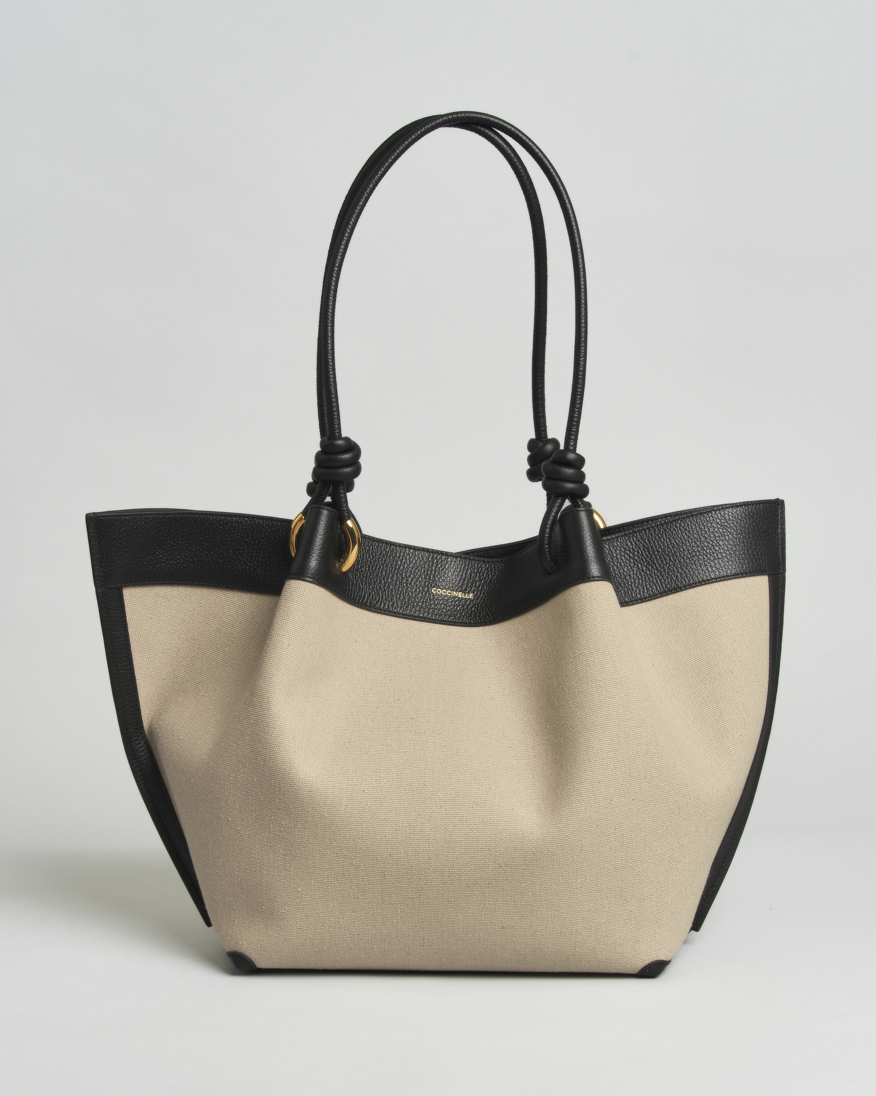 Borsa shopper grande Finn Coccinelle in canvas con inserti e manici neri in pelle