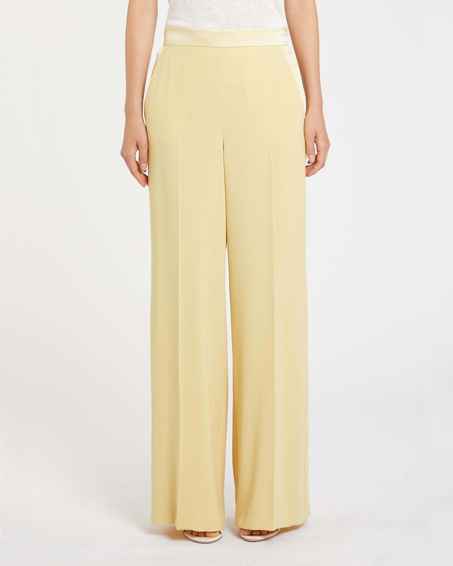 Pantaloni a palazzo gialli in crepe con piega fronte e retro e chiusura a zip
