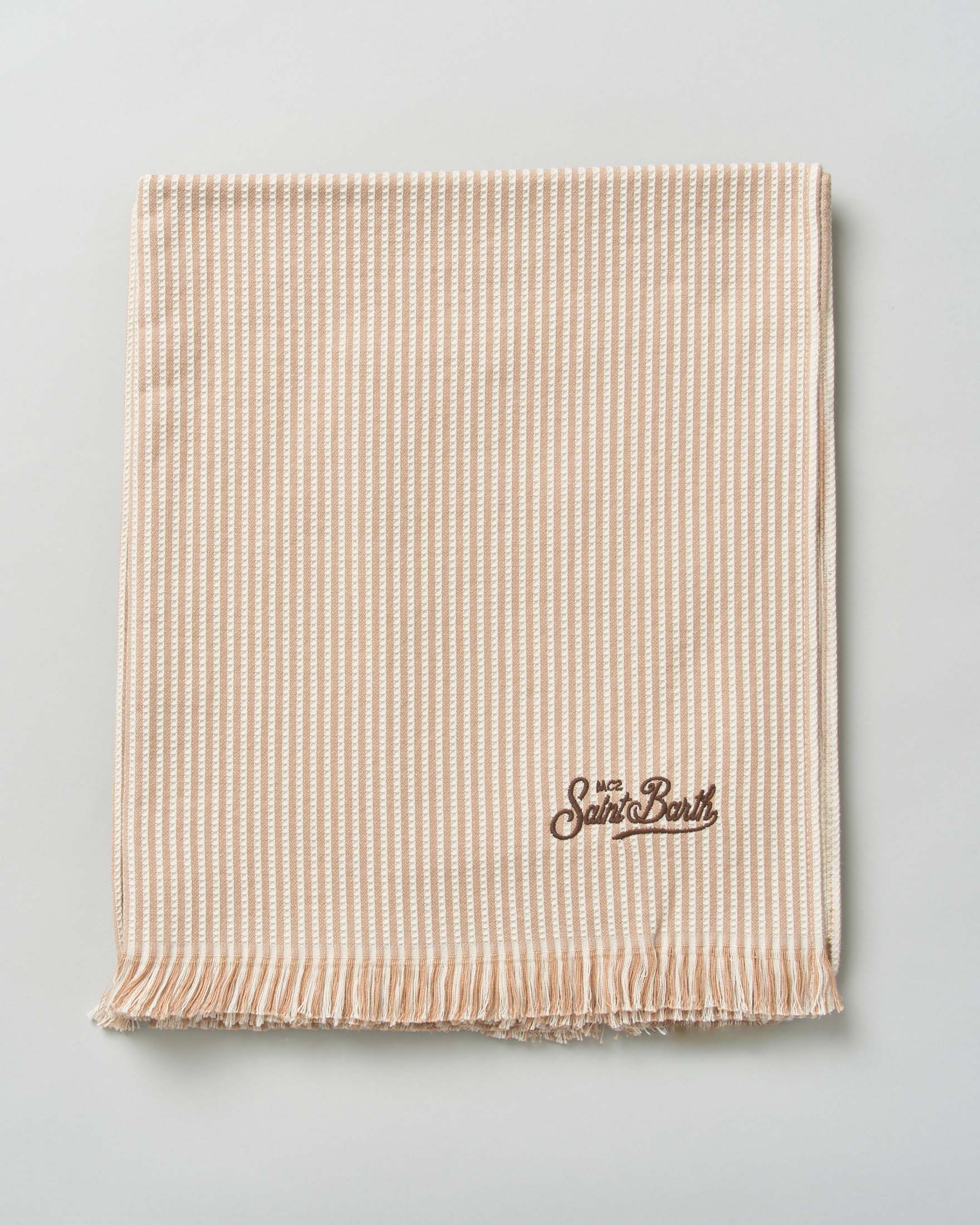 Telo mare beige in seersucker di cotone