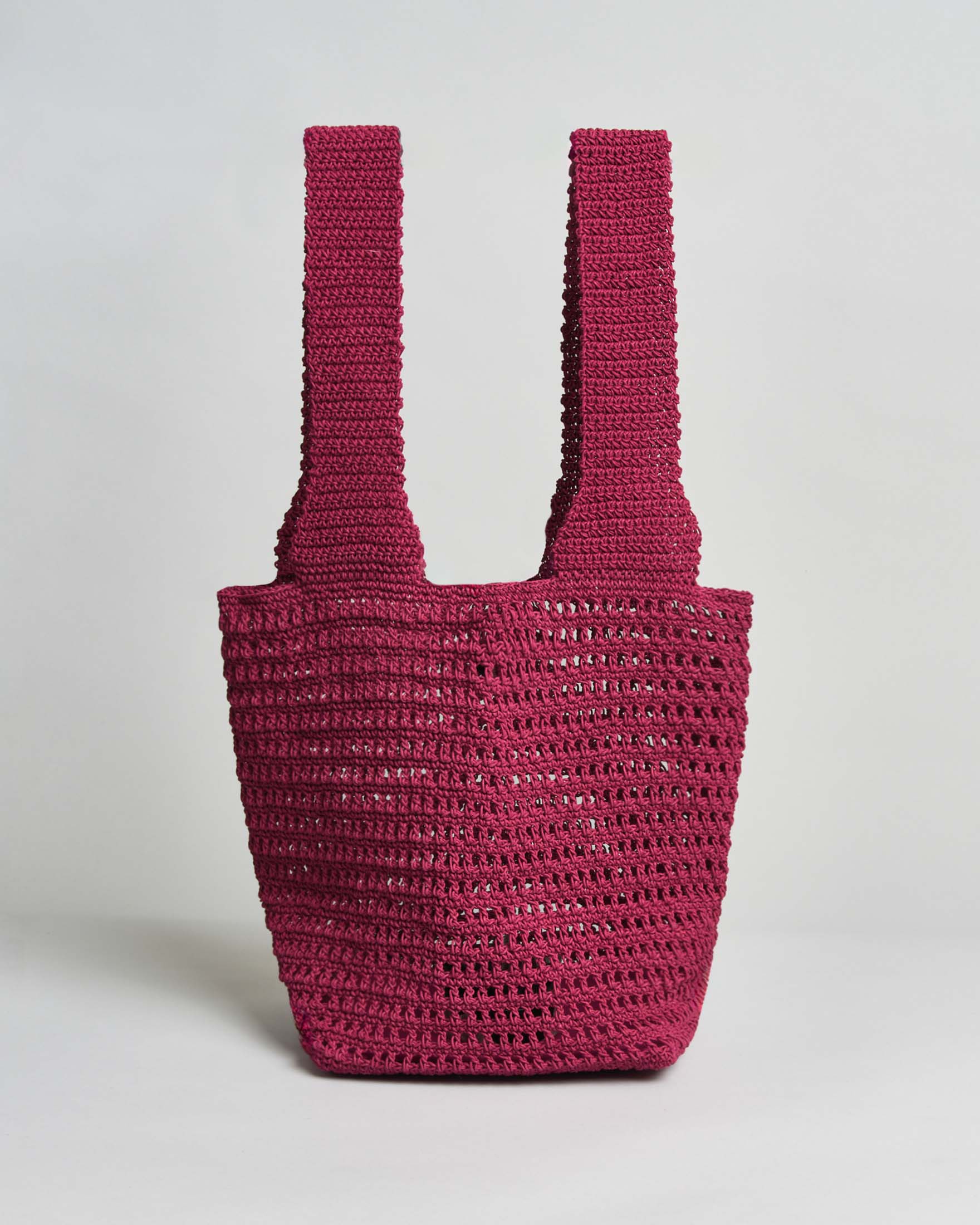 Shopper crochet fucsia traforata con base squadrata
