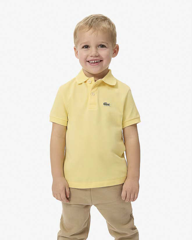 Polo Lacoste gialla in piqué di puro cotone
